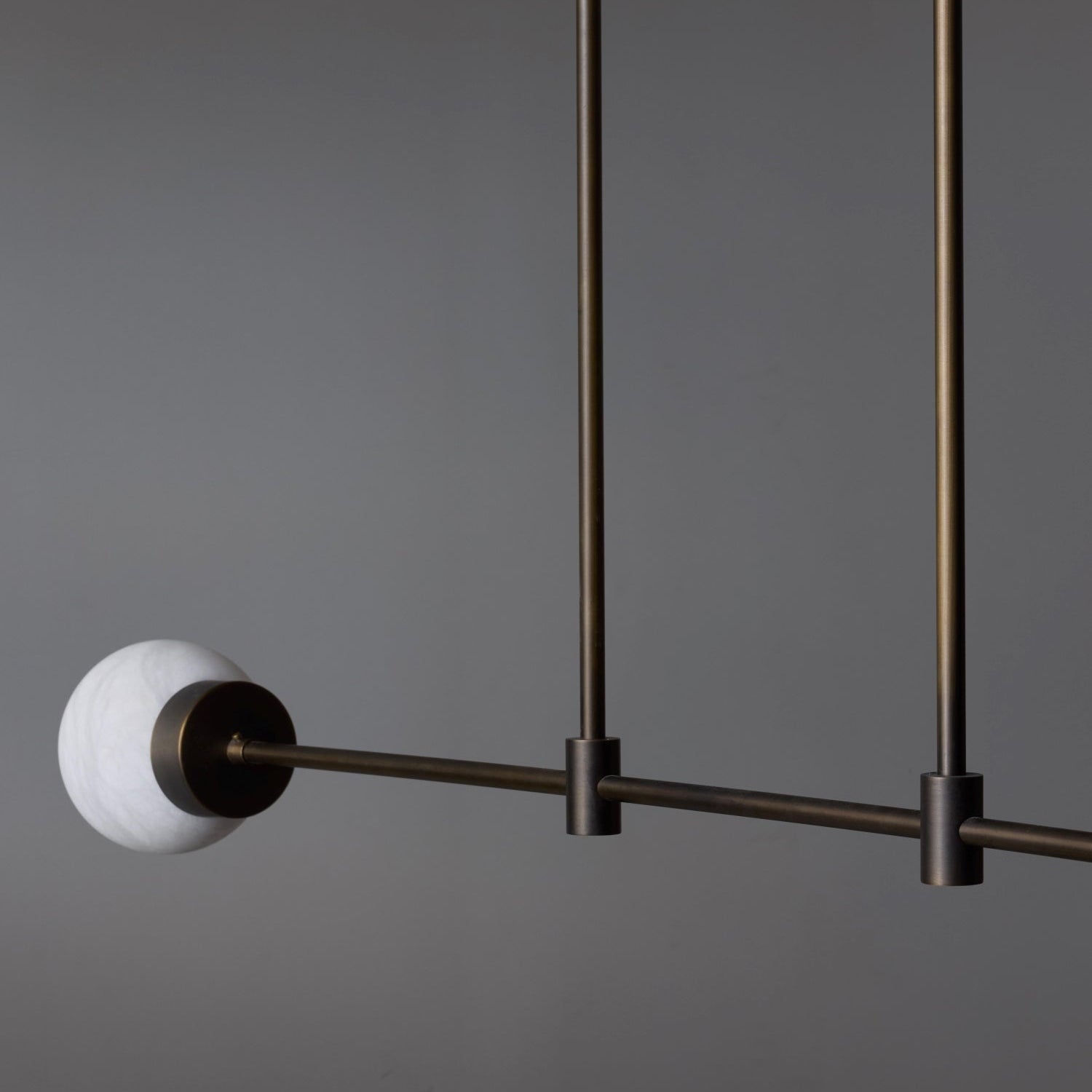 Brass and Alabaster Globes Asymmetrical Line Chandelier