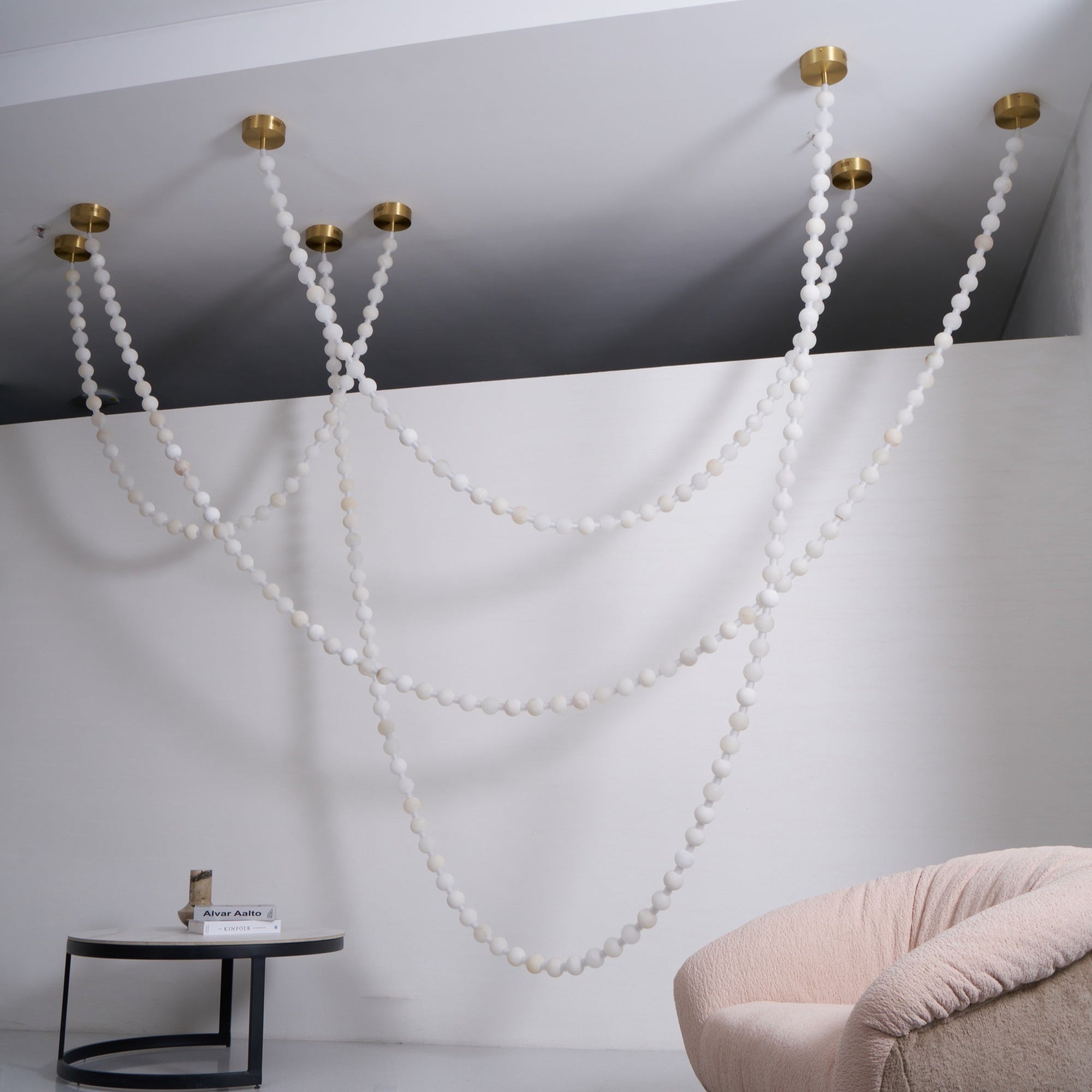 https://cdn.shopify.com/s/files/1/0736/8795/7790/files/alabaster-pearl-necklace-chandelier-1539227.jpg?v=1773801534