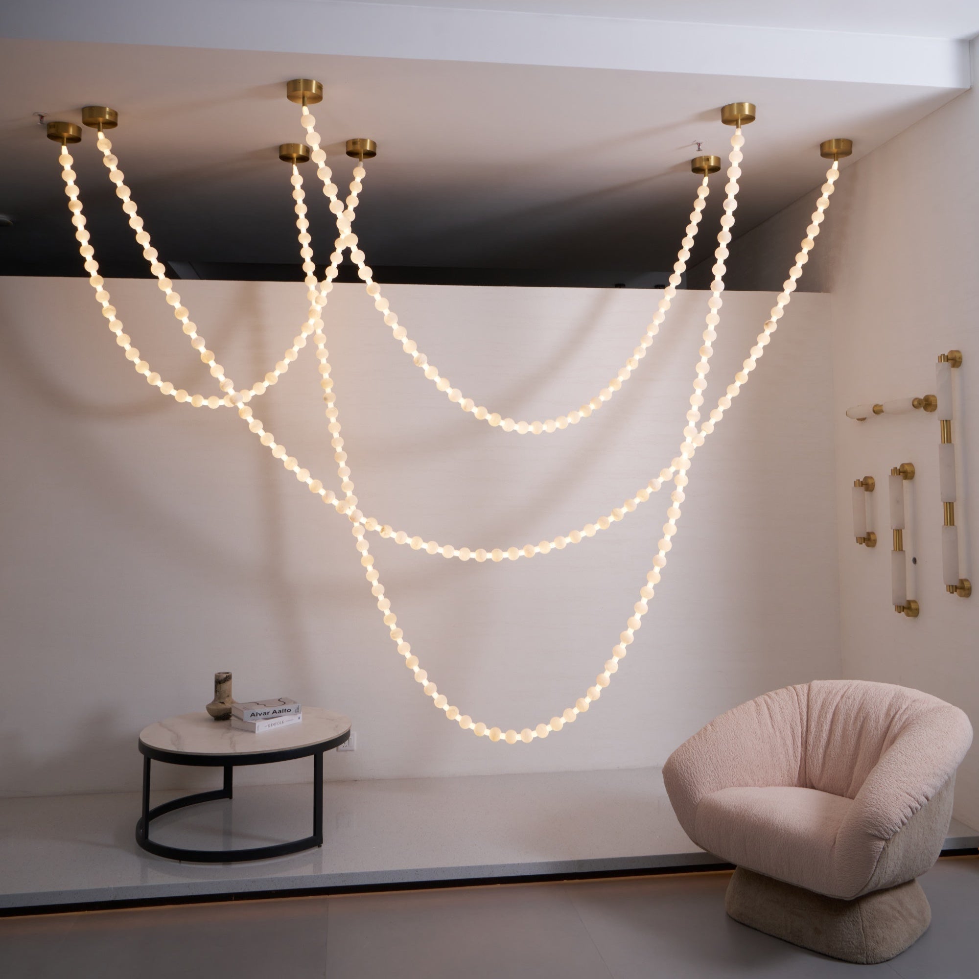 https://cdn.shopify.com/s/files/1/0736/8795/7790/files/alabaster-pearl-necklace-chandelier-1879107.jpg?v=1773801535
