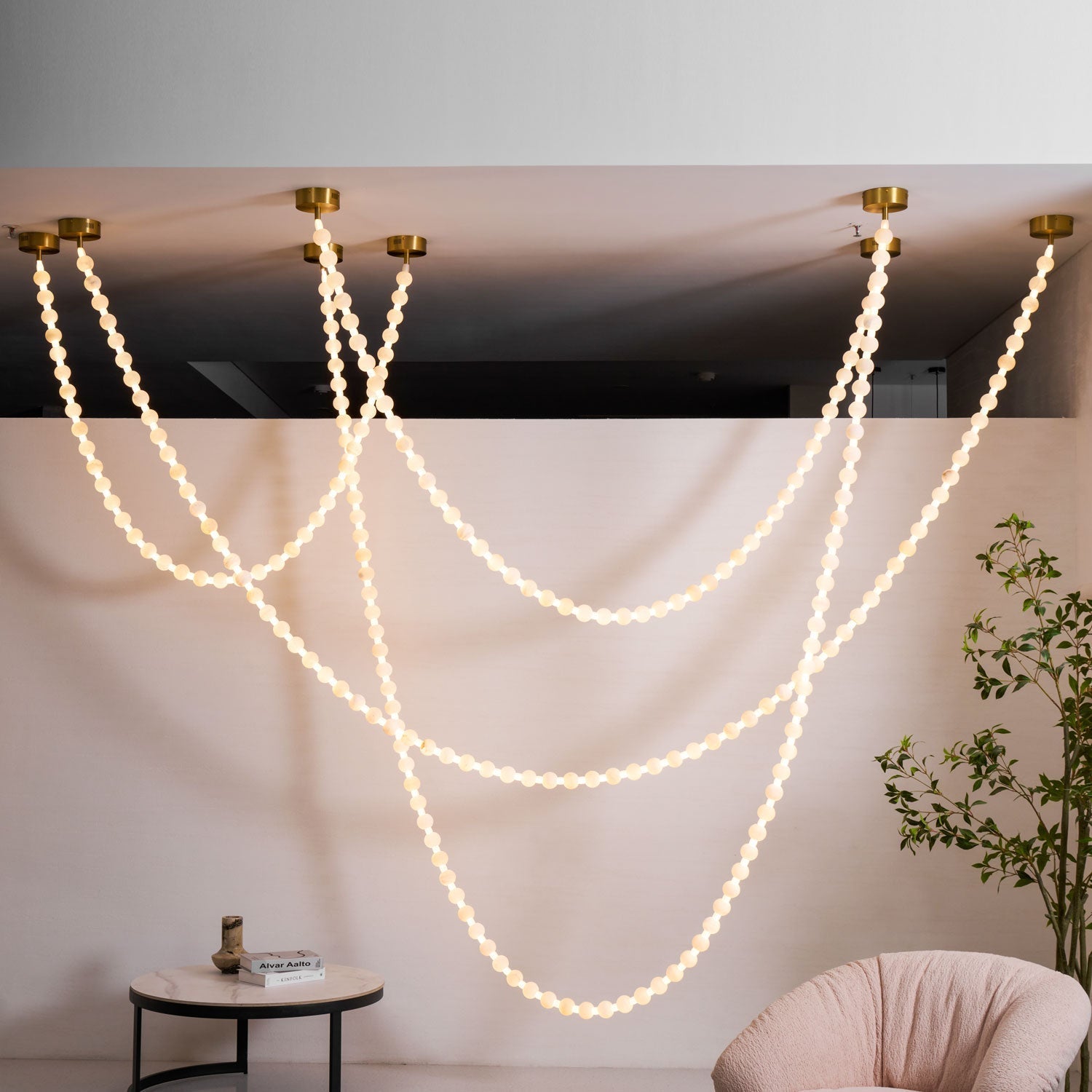 https://cdn.shopify.com/s/files/1/0736/8795/7790/files/alabaster-pearl-necklace-chandelier-2162142.jpg?v=1773801533