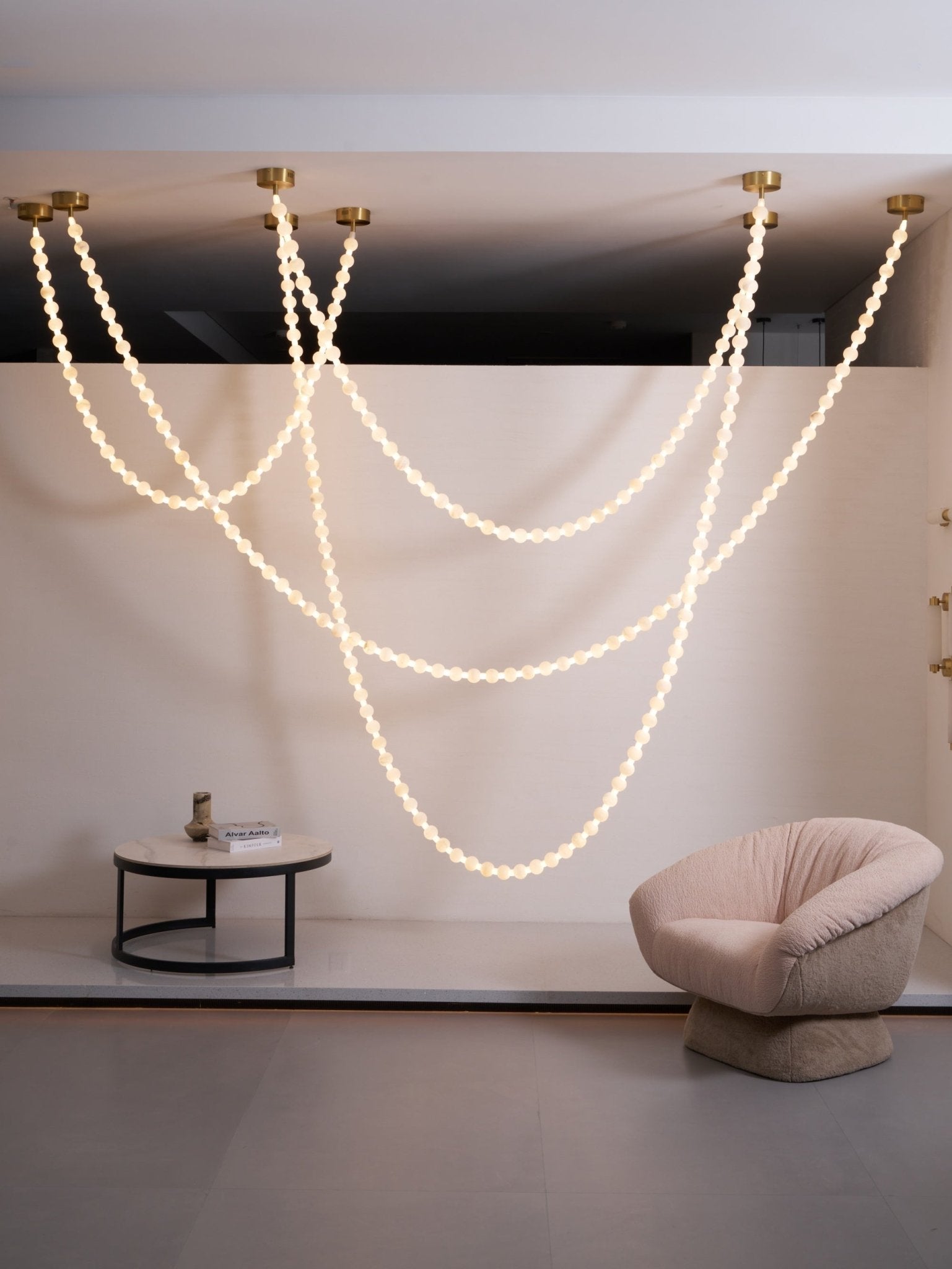 https://cdn.shopify.com/s/files/1/0736/8795/7790/files/alabaster-pearl-necklace-chandelier-3842470.jpg?v=1773801534