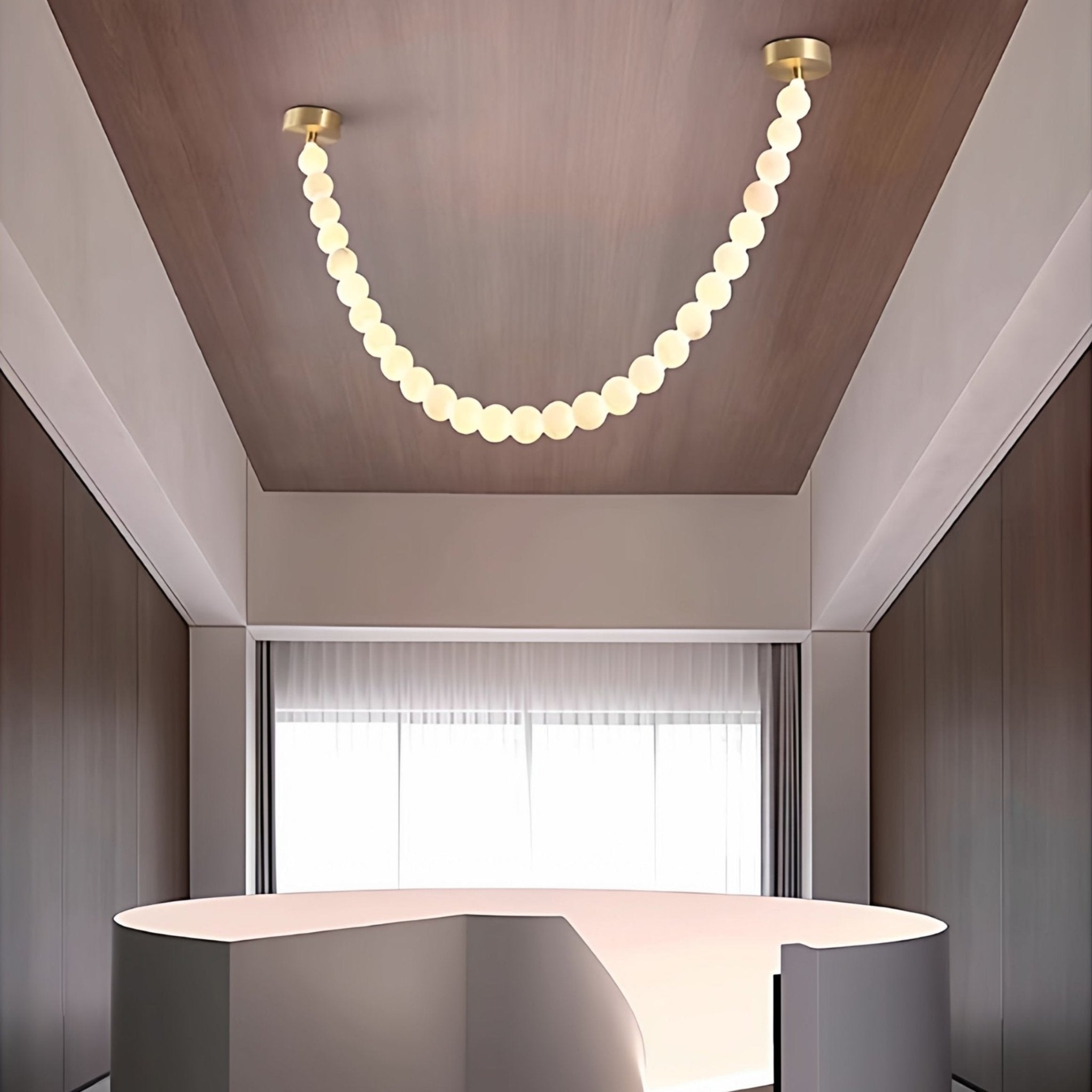 https://cdn.shopify.com/s/files/1/0736/8795/7790/files/alabaster-pearl-necklace-chandelier-4293287.jpg?v=1773801545