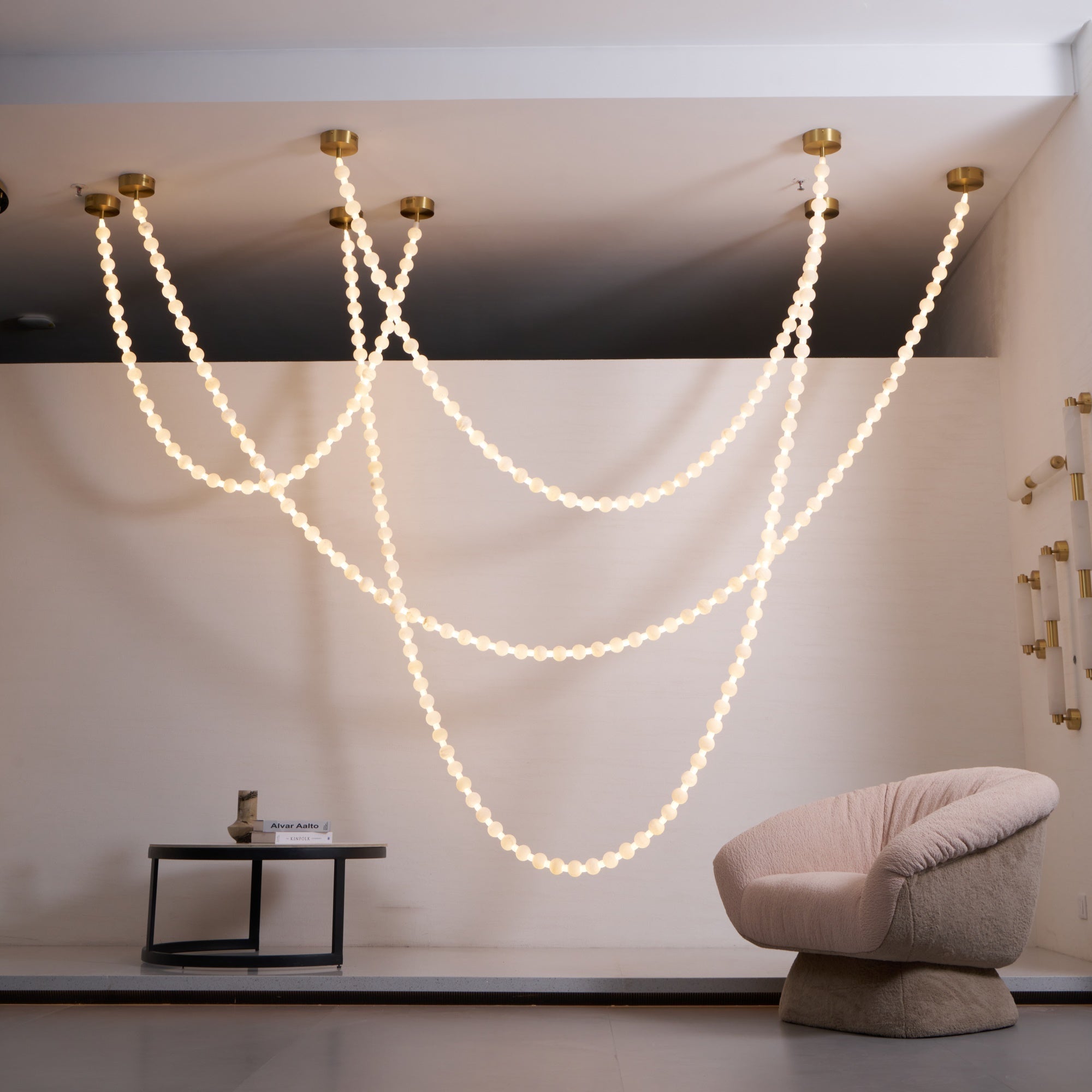 https://cdn.shopify.com/s/files/1/0736/8795/7790/files/alabaster-pearl-necklace-chandelier-5376266.jpg?v=1773801534