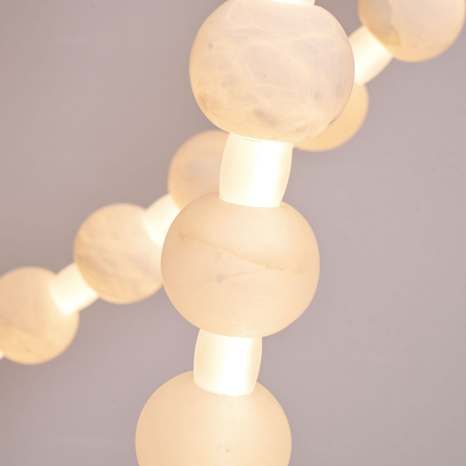 https://cdn.shopify.com/s/files/1/0736/8795/7790/files/alabaster-pearl-necklace-chandelier-5558465.jpg?v=1773801533