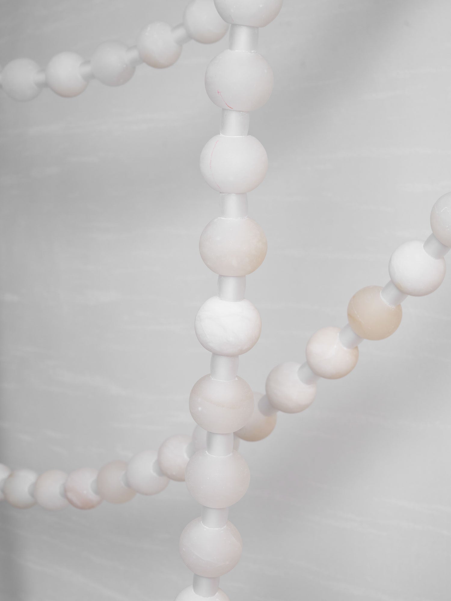 https://cdn.shopify.com/s/files/1/0736/8795/7790/files/alabaster-pearl-necklace-chandelier-6050683.jpg?v=1773801533