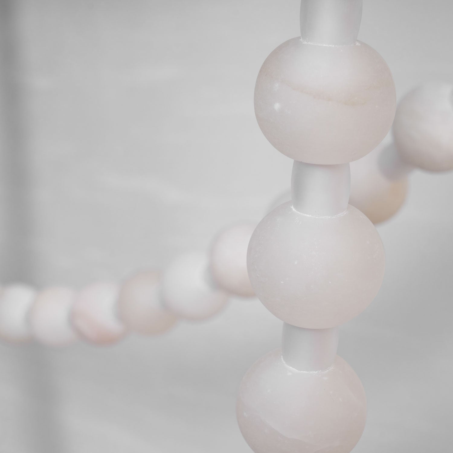 https://cdn.shopify.com/s/files/1/0736/8795/7790/files/alabaster-pearl-necklace-chandelier-6125329.jpg?v=1773801534