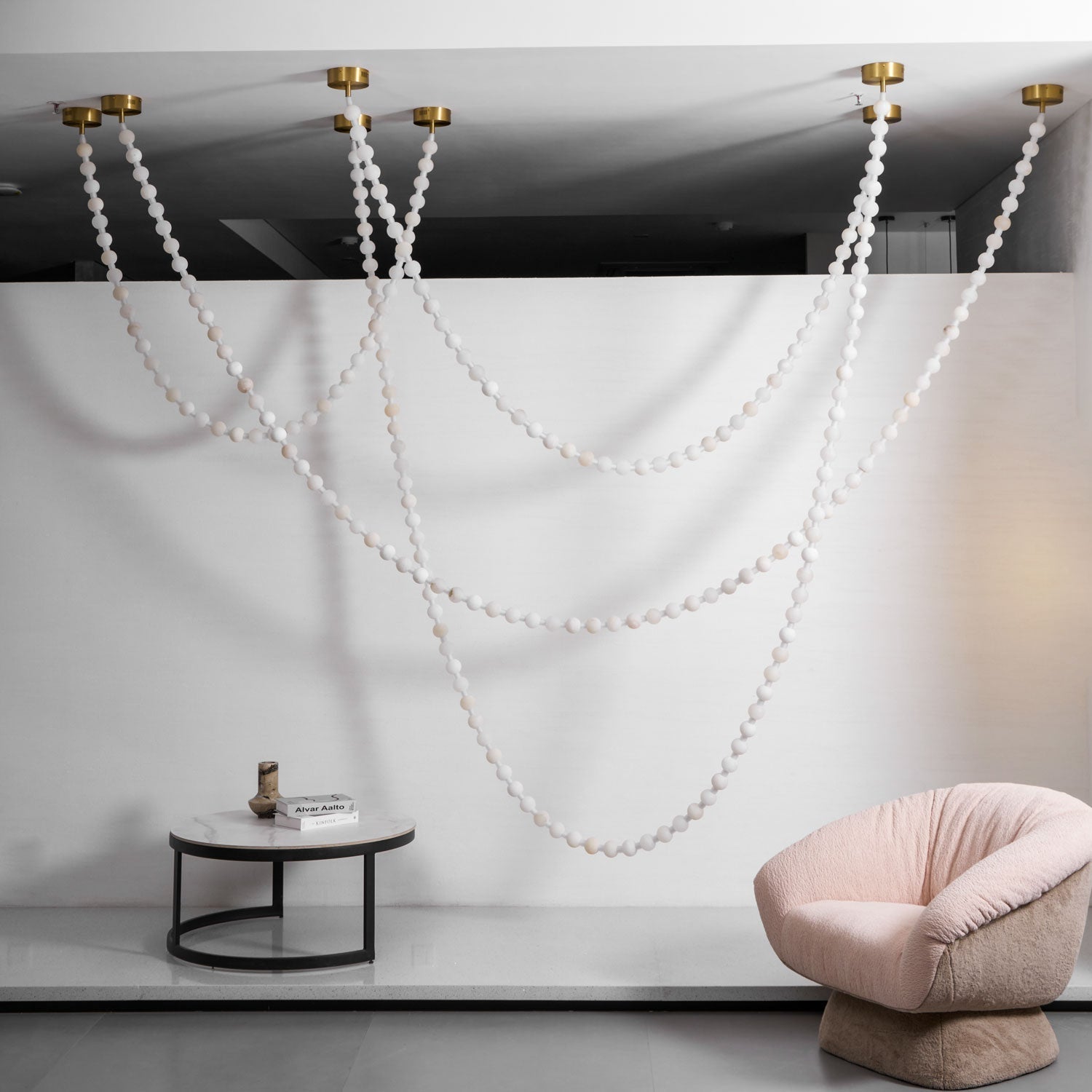 https://cdn.shopify.com/s/files/1/0736/8795/7790/files/alabaster-pearl-necklace-chandelier-6871417.jpg?v=1773801534