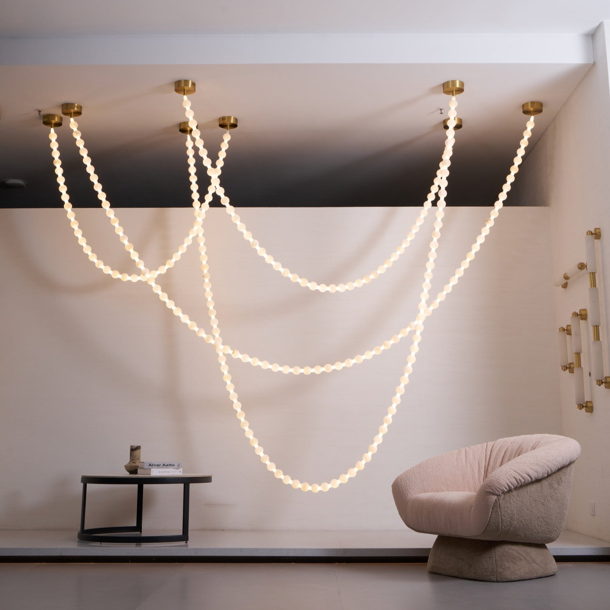 https://cdn.shopify.com/s/files/1/0736/8795/7790/files/alabaster-pearl-necklace-chandelier-7504842.jpg?v=1773801534