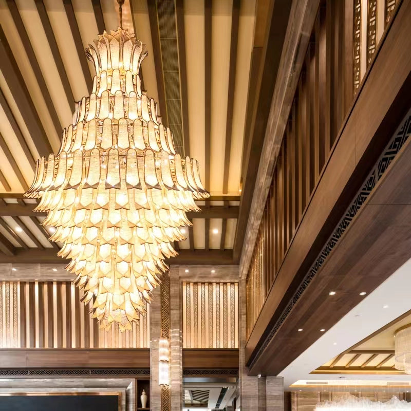 https://cdn.shopify.com/s/files/1/0736/8795/7790/files/extra-large-luxury-multi-tier-gold-crystalchandelier-for-stairslarge-high-ceiling-room-merlin-lamps-5.jpg?v=1765406237