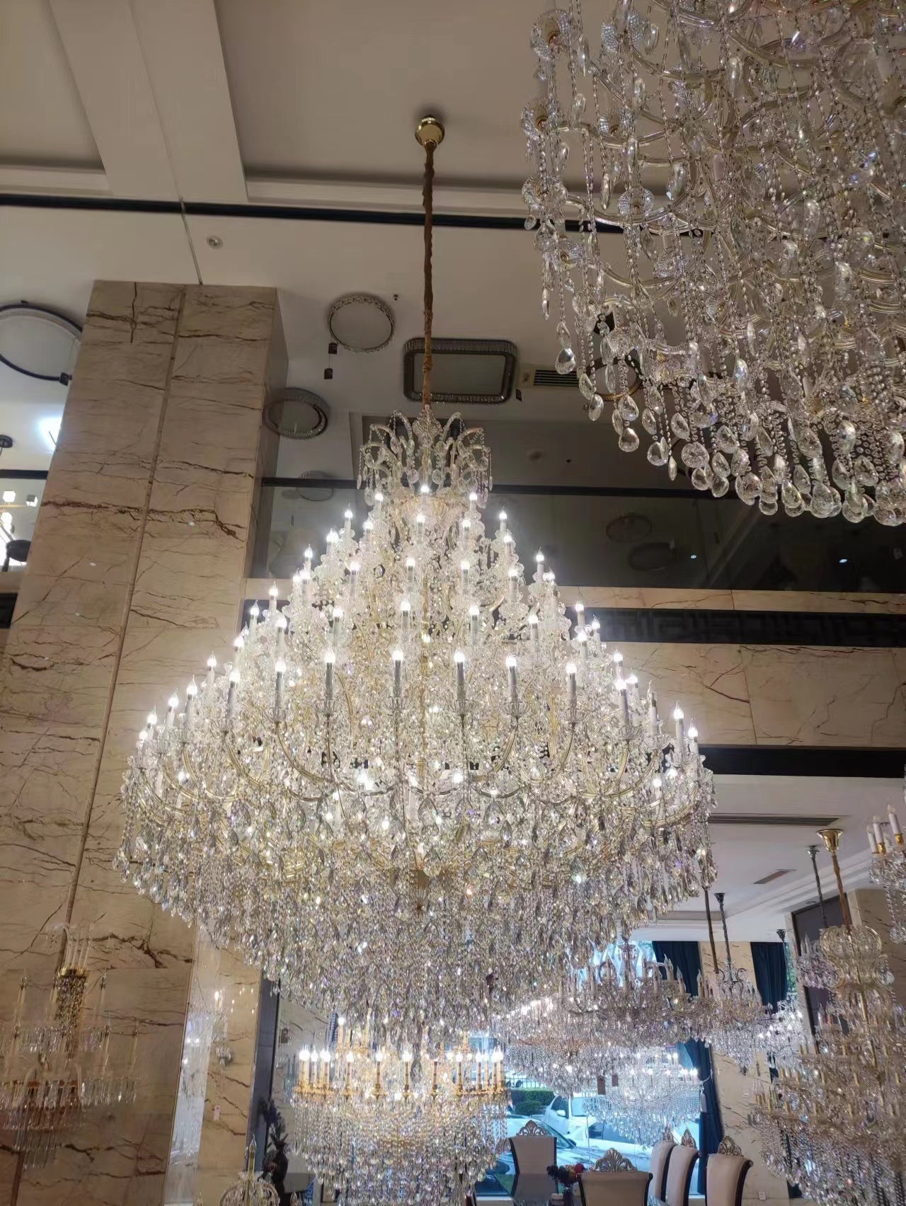 https://cdn.shopify.com/s/files/1/0778/2046/1351/files/extra-large-multi-tiered-candle-light-crystal-chandelier-for-hotelrestaurant-merlin-lamps-10.jpg?v=1765781477