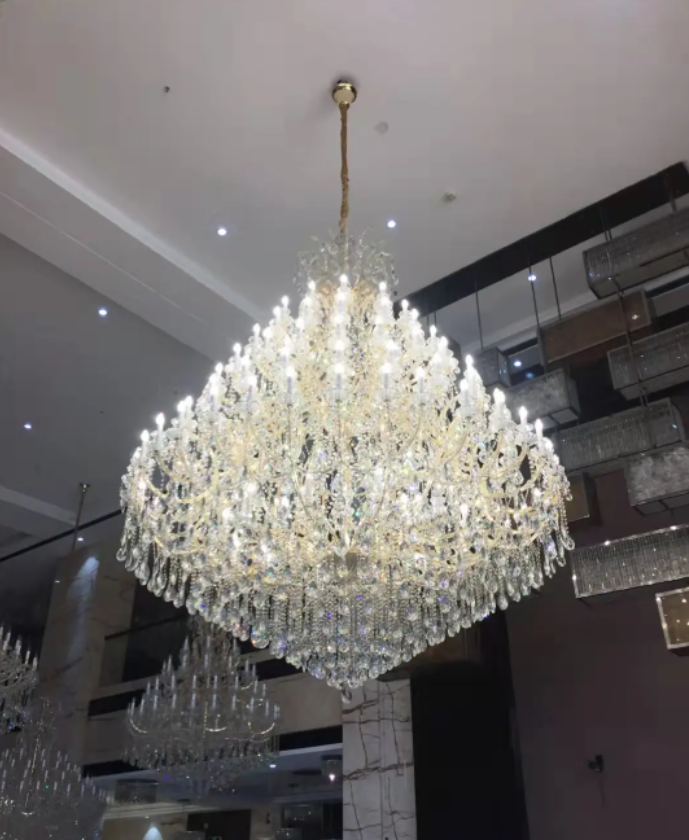 https://cdn.shopify.com/s/files/1/0778/2046/1351/files/extra-large-multi-tiered-candle-light-crystal-chandelier-for-hotelrestaurant-merlin-lamps-19.png?v=1765781478