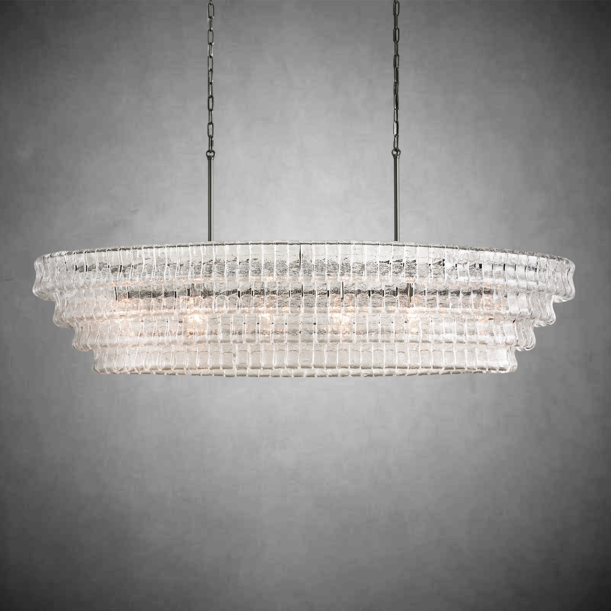 https://cdn.shopify.com/s/files/1/0736/8795/7790/files/ghiaccio-glass-oval-chandelier-5465-merlin-lamps-21.jpg?v=1765380255