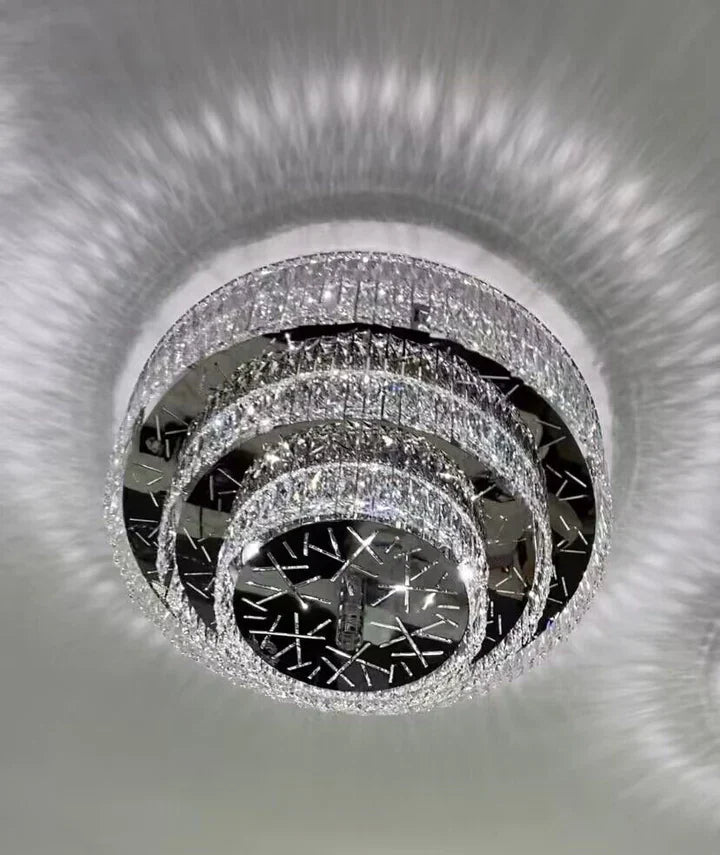 https://cdn.shopify.com/s/files/1/0736/8795/7790/files/oversized-modern-creative-flush-mount-round-multi-layers-crystal-pendant-chandelier-for-livingdining-roomhallway-merlin-lamps-6.webp?v=1765402422