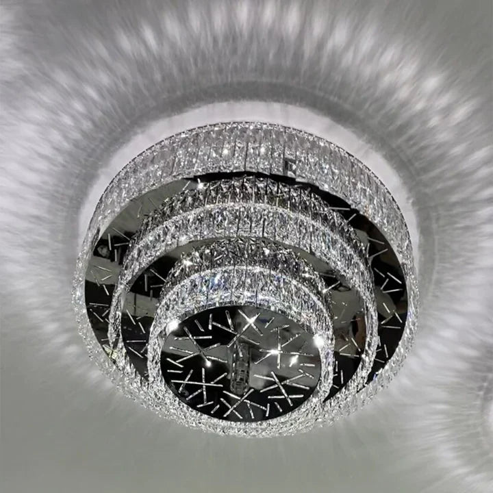https://cdn.shopify.com/s/files/1/0736/8795/7790/files/oversized-modern-creative-flush-mount-round-multi-layers-crystal-pendant-chandelier-for-livingdining-roomhallway-merlin-lamps.webp?v=1765402414