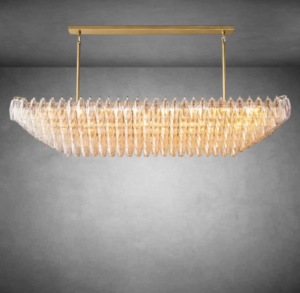 https://cdn.shopify.com/s/files/1/0736/8795/7790/files/renee-clear-glass-tiered-rectangular-chandelier-54-74-merlin-lamps-6.jpg?v=1765395144