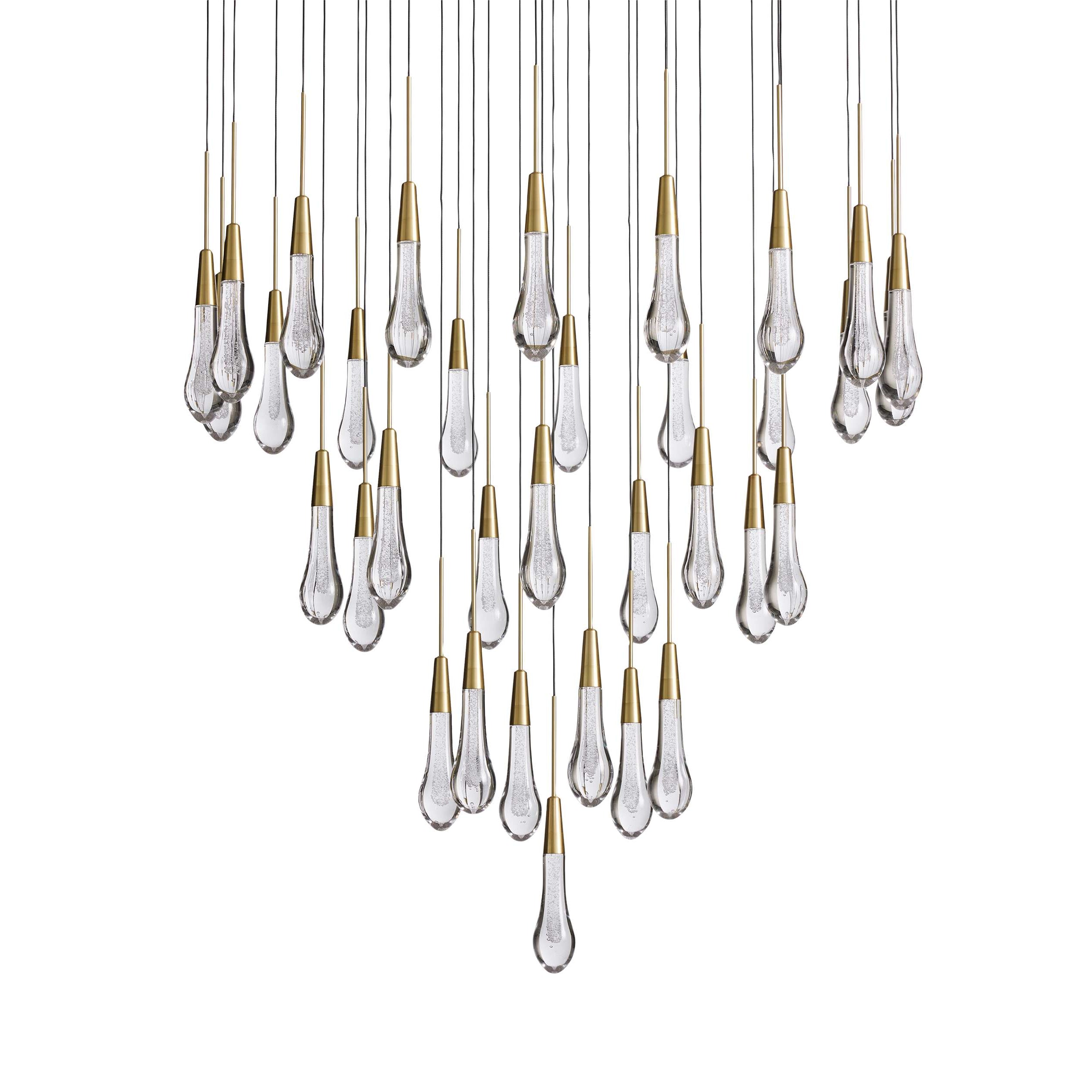 https://cdn.shopify.com/s/files/1/0736/8795/7790/files/solitaire-modern-17-24-36-58-round-chandelier-lighting-merlin-lamps-28.jpg?v=1765374476