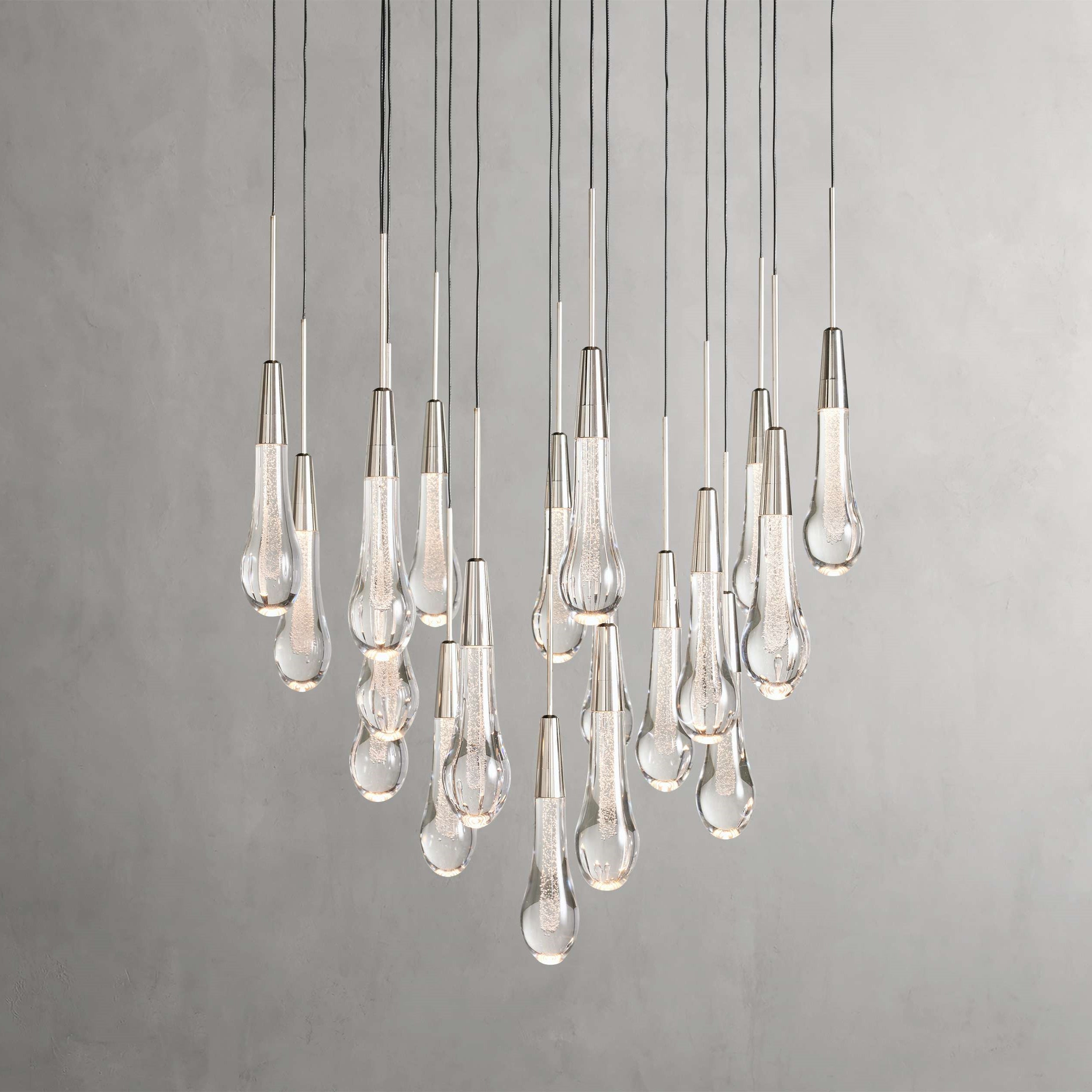 https://cdn.shopify.com/s/files/1/0736/8795/7790/files/solitaire-modern-17-24-36-58-round-chandelier-lighting-merlin-lamps-9.jpg?v=1765374442