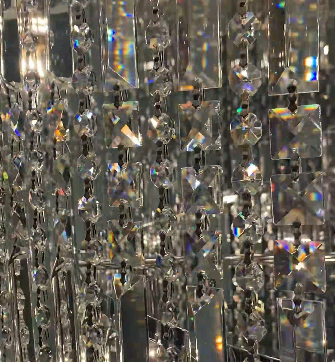 https://cdn.shopify.com/s/files/1/0554/8562/8591/files/Modern_Crystal_Tassel_Chandelier_For_Foyer_Staircase_1.png?v=1775619528