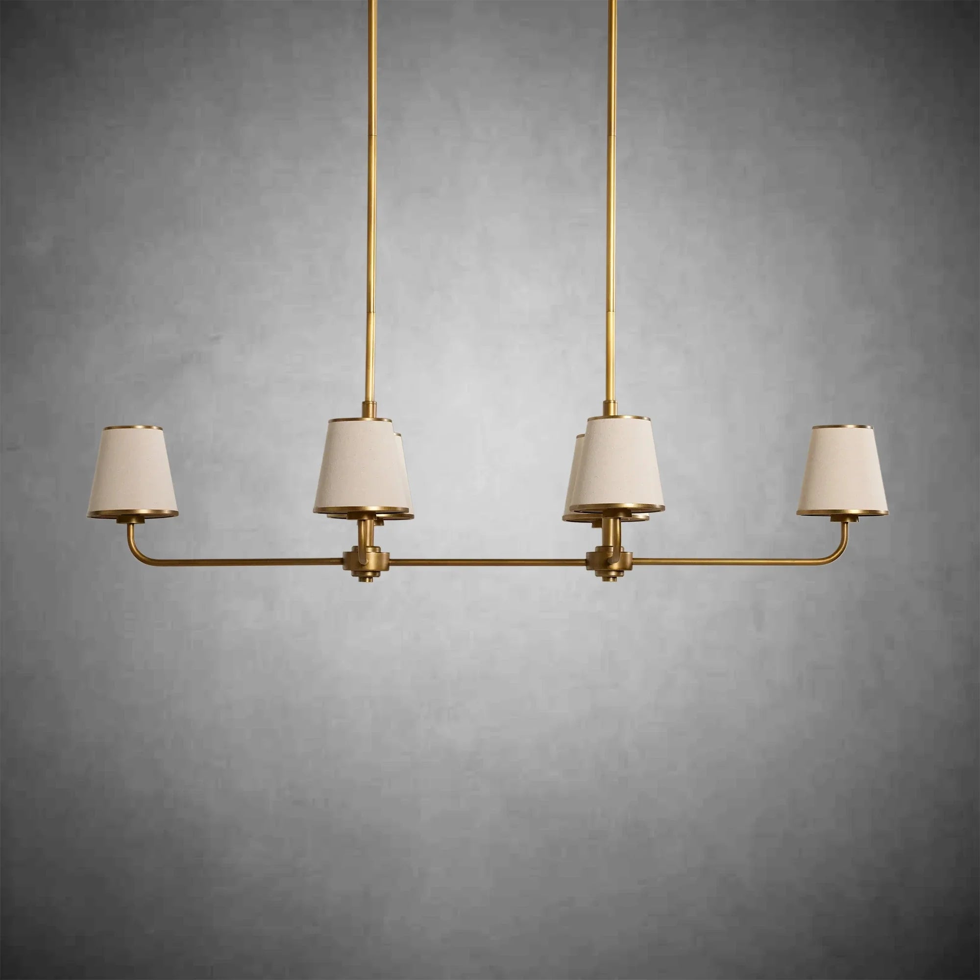 https://cdn.shopify.com/s/files/1/0736/8795/7790/files/adria-linear-chandelier-flax-2.webp?v=1772445244