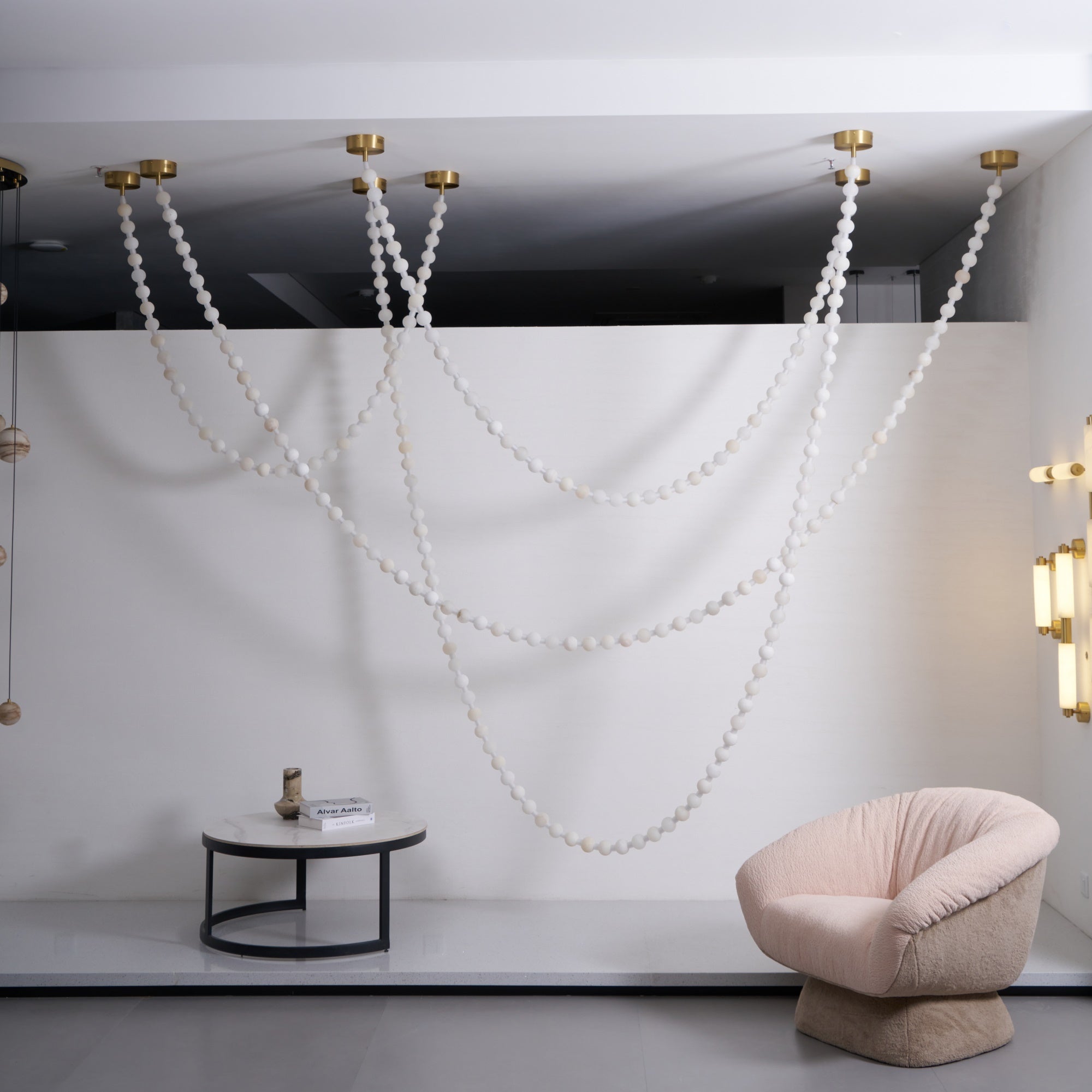 https://cdn.shopify.com/s/files/1/0736/8795/7790/files/alabaster-pearl-necklace-chandelier-1802563.jpg?v=1773801534