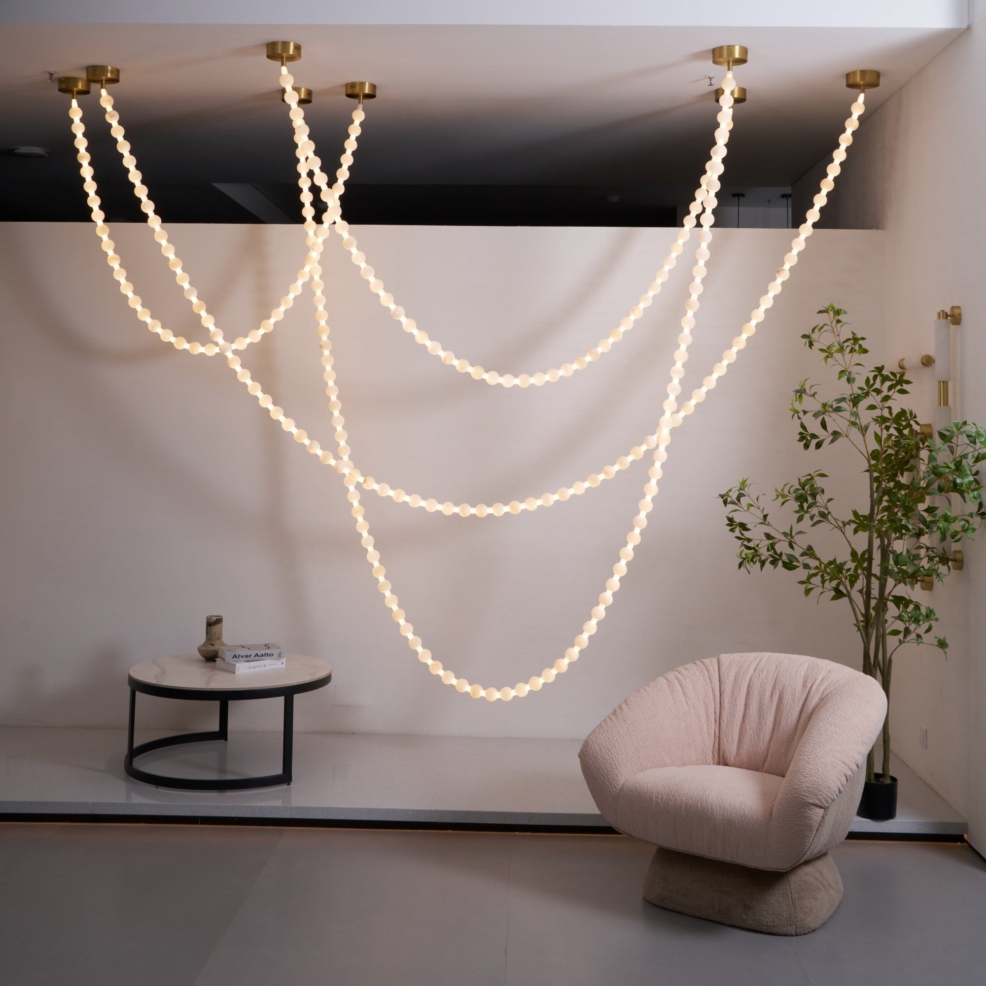 https://cdn.shopify.com/s/files/1/0736/8795/7790/files/alabaster-pearl-necklace-chandelier-3905222.jpg?v=1773801534