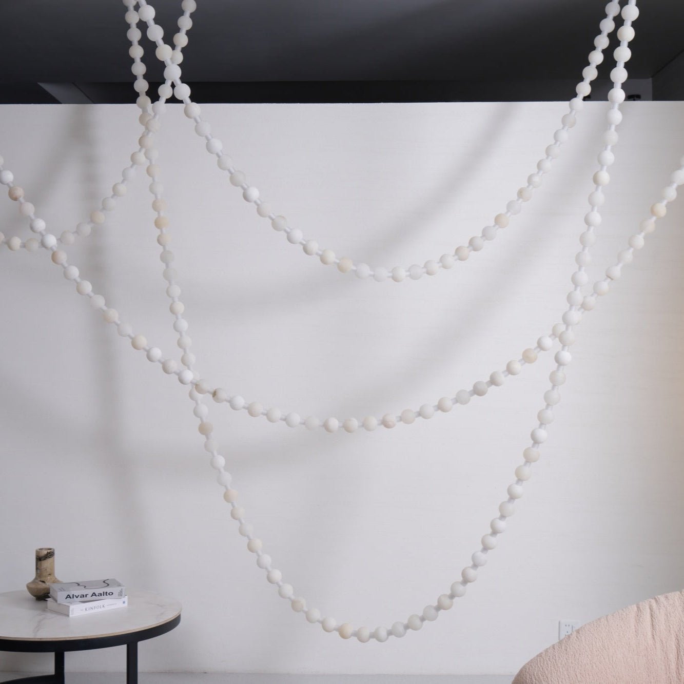 https://cdn.shopify.com/s/files/1/0736/8795/7790/files/alabaster-pearl-necklace-chandelier-6092534.jpg?v=1773801534