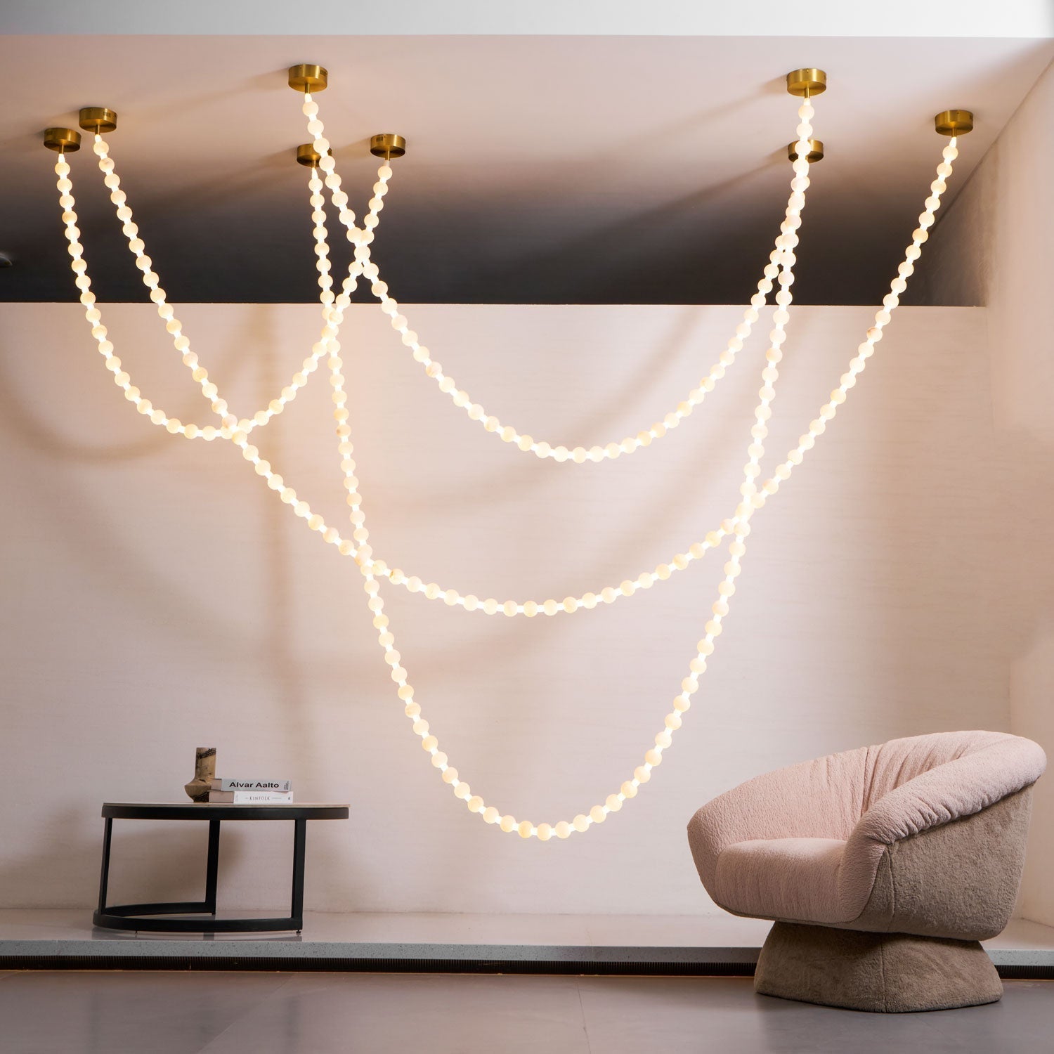 https://cdn.shopify.com/s/files/1/0736/8795/7790/files/alabaster-pearl-necklace-chandelier-7071991.jpg?v=1773801534