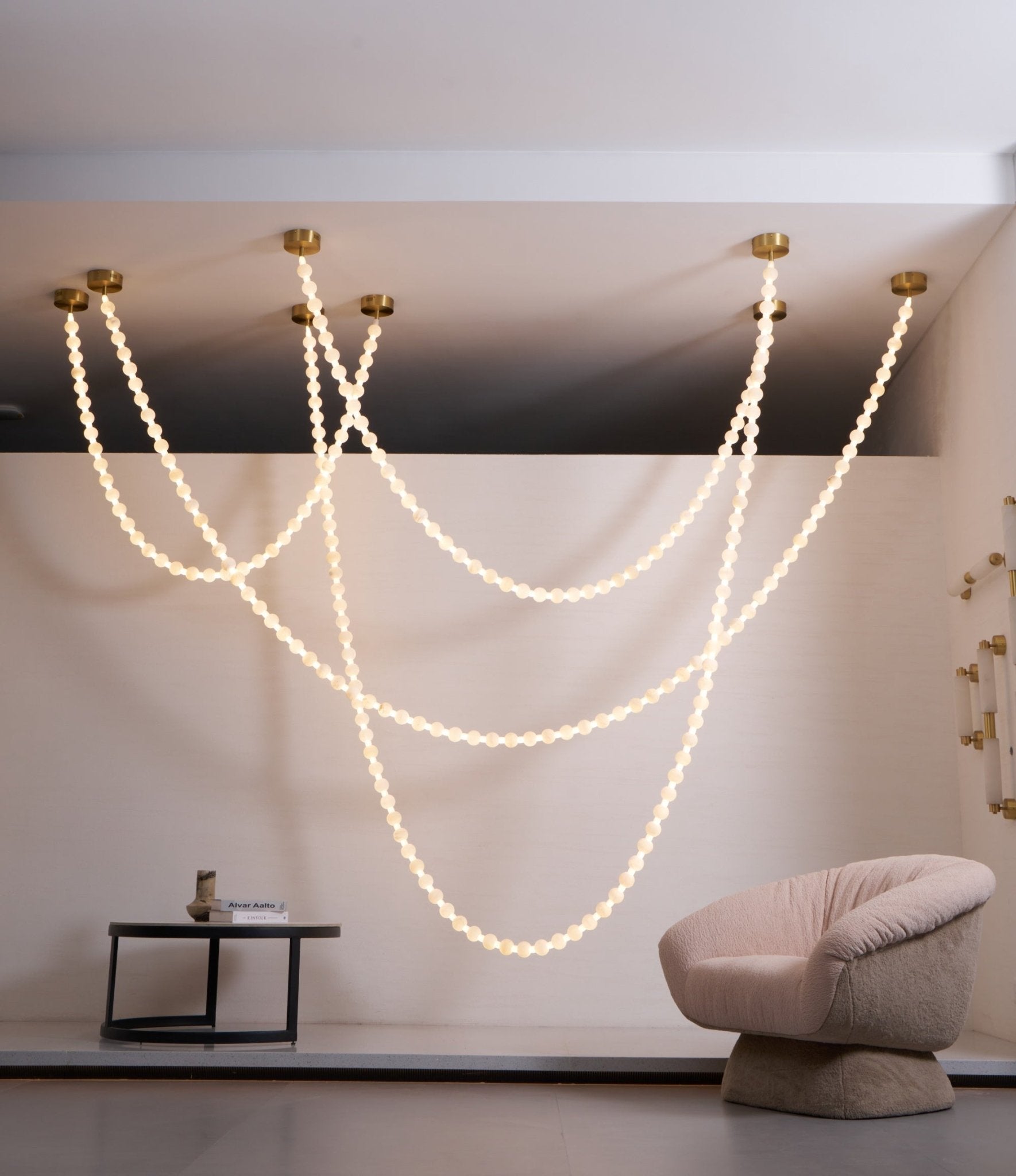 https://cdn.shopify.com/s/files/1/0736/8795/7790/files/alabaster-pearl-necklace-chandelier-7423400.jpg?v=1773801534