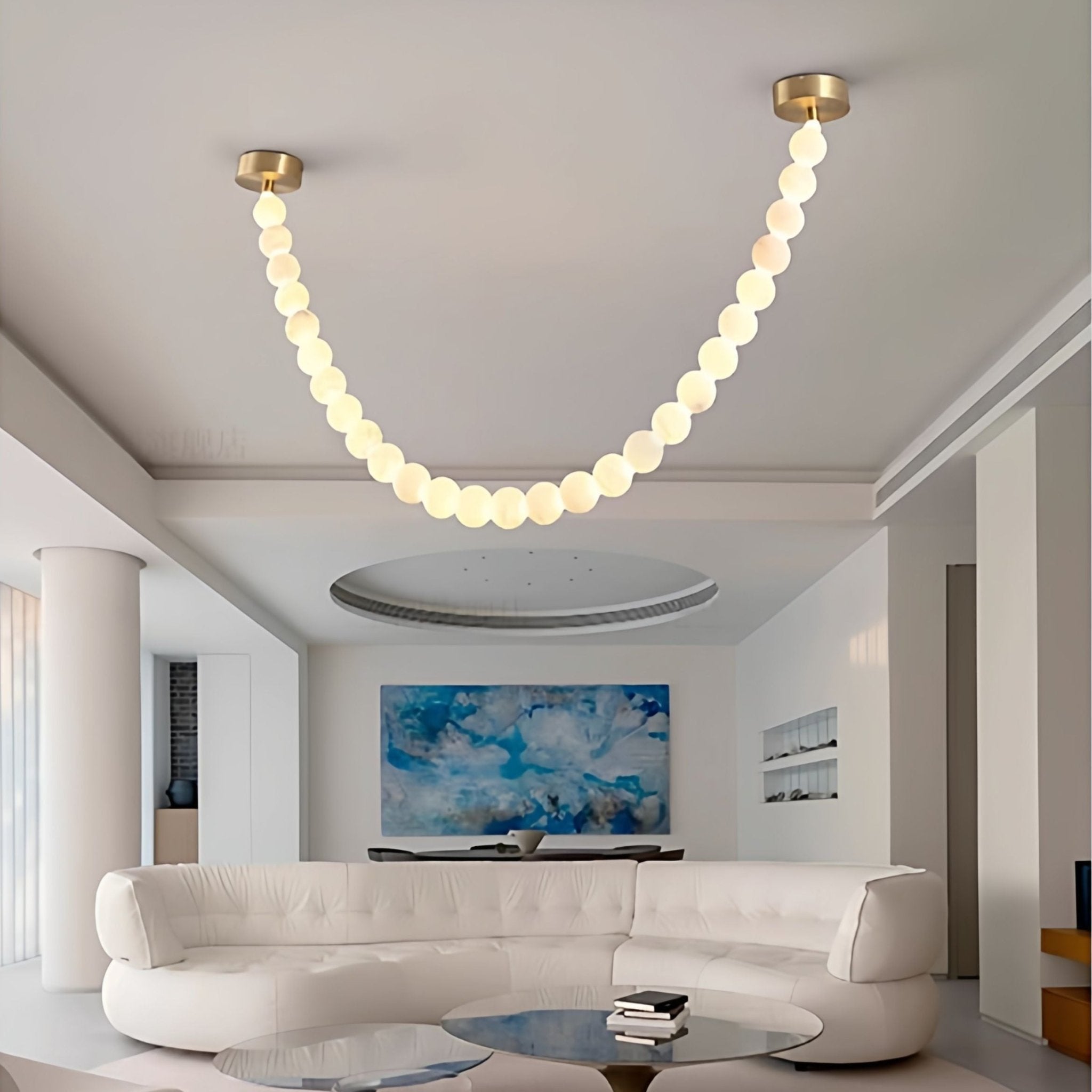 https://cdn.shopify.com/s/files/1/0736/8795/7790/files/alabaster-pearl-necklace-chandelier-7628225.jpg?v=1773801534