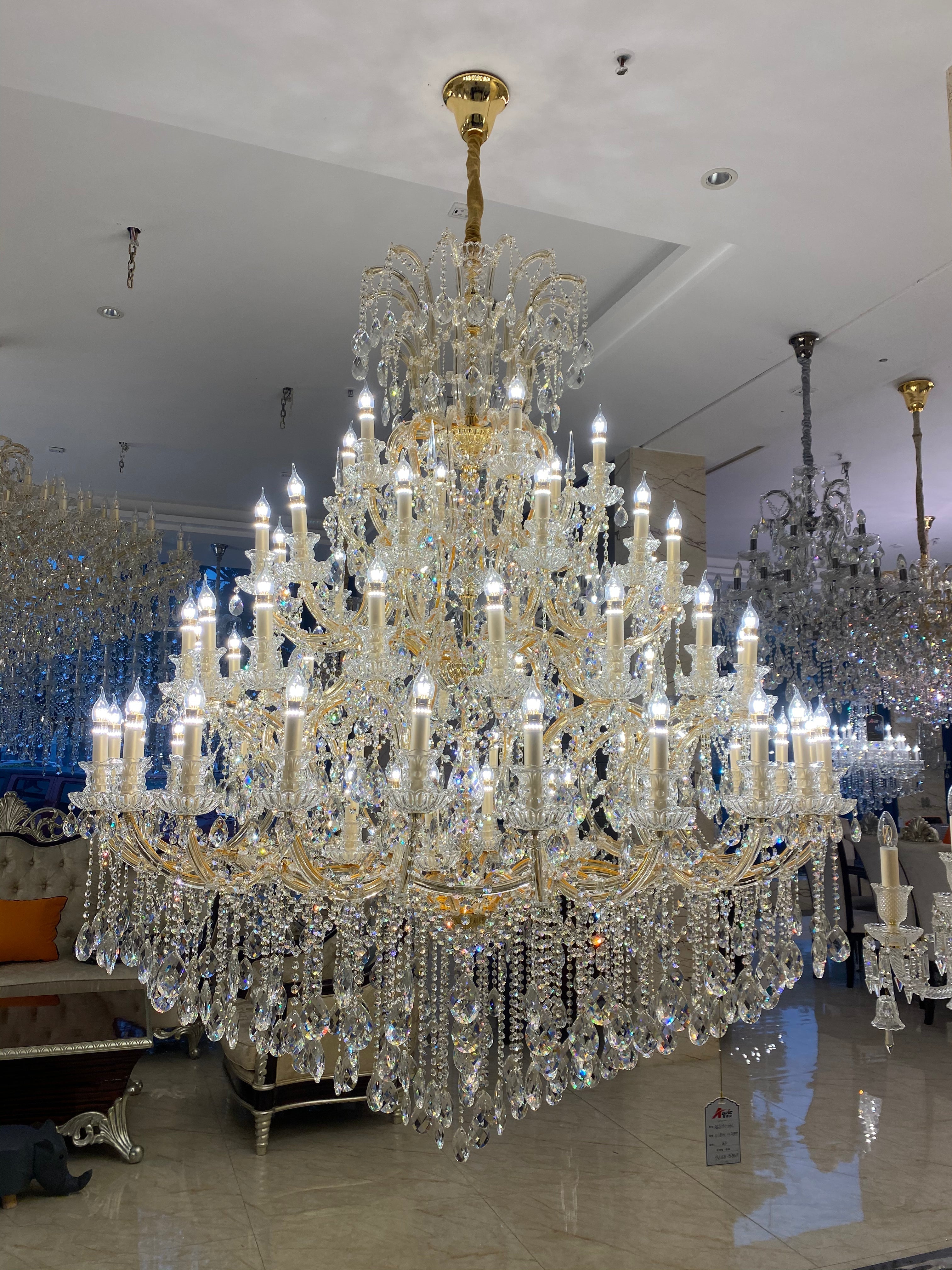 https://cdn.shopify.com/s/files/1/0778/2046/1351/files/extra-large-multi-tiered-candle-light-crystal-chandelier-for-hotelrestaurant-merlin-lamps-23.jpg?v=1765781478