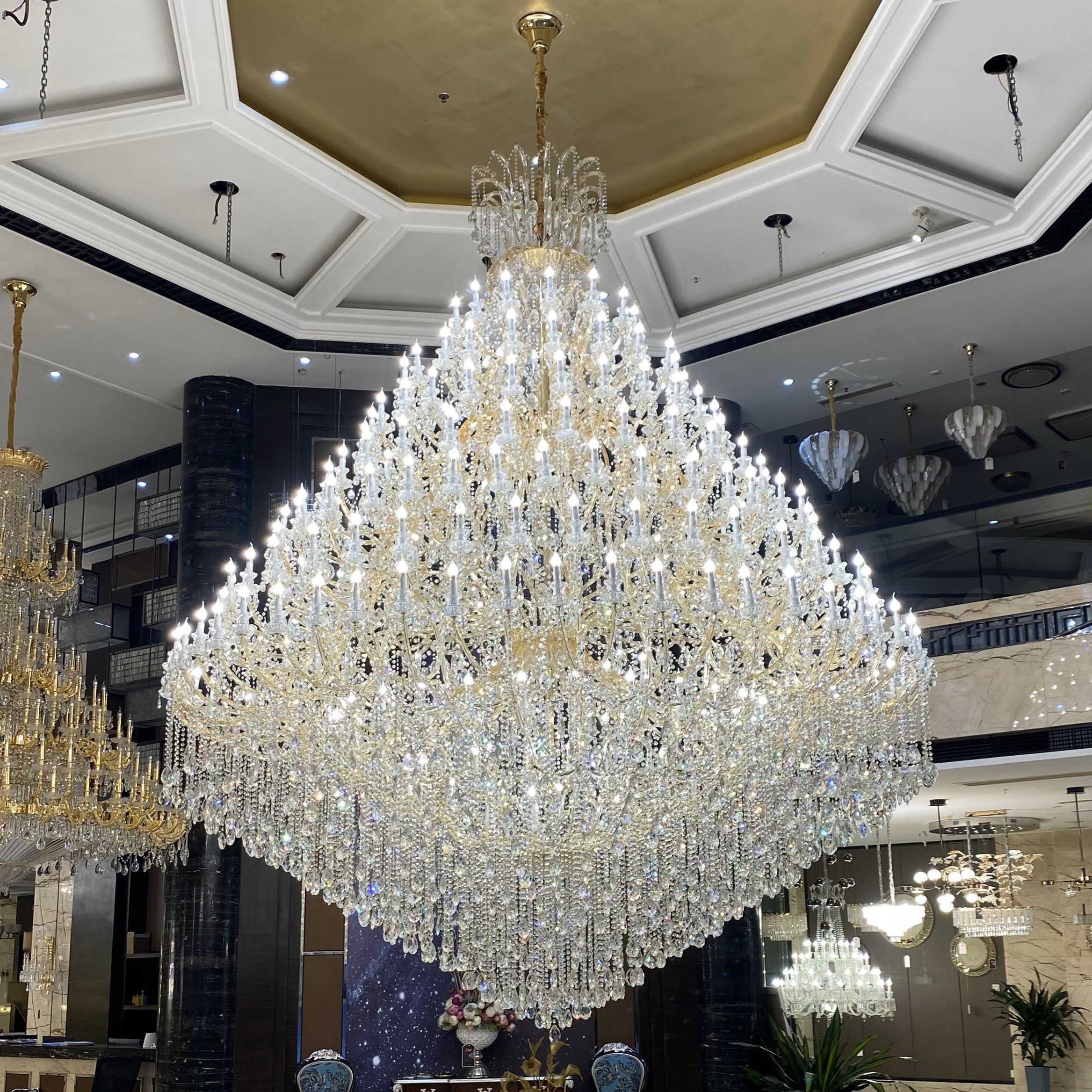 https://cdn.shopify.com/s/files/1/0778/2046/1351/files/extra-large-multi-tiered-candle-light-crystal-chandelier-for-hotelrestaurant-merlin-lamps.jpg?v=1765781477