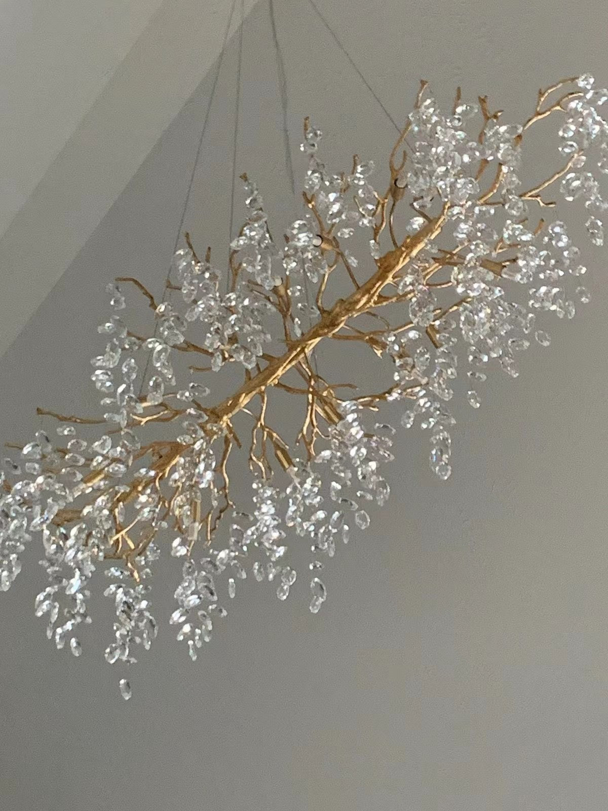 https://cdn.shopify.com/s/files/1/0618/9567/1984/files/fanci-chandeliers-french-branch-crystal-chandelier-with-elegant-crystal-leaves-4.jpg?v=1765943497