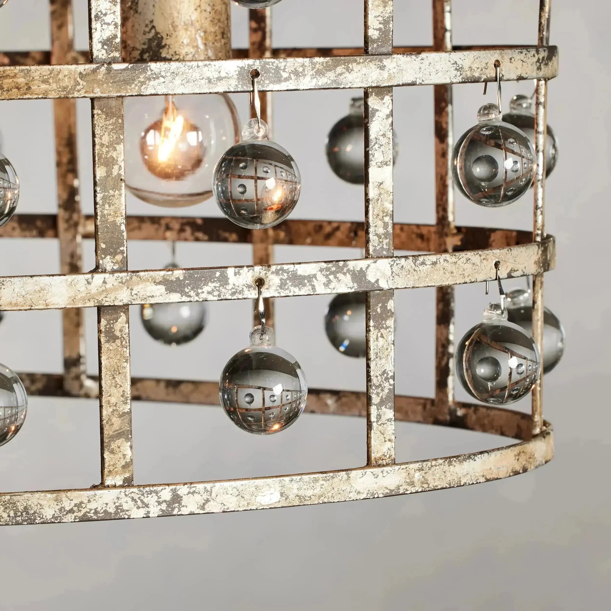 https://cdn.shopify.com/s/files/1/0618/9567/1984/files/fanci-lighting-la-cage-oval-chandelier-5-light-6.webp?v=1765964208