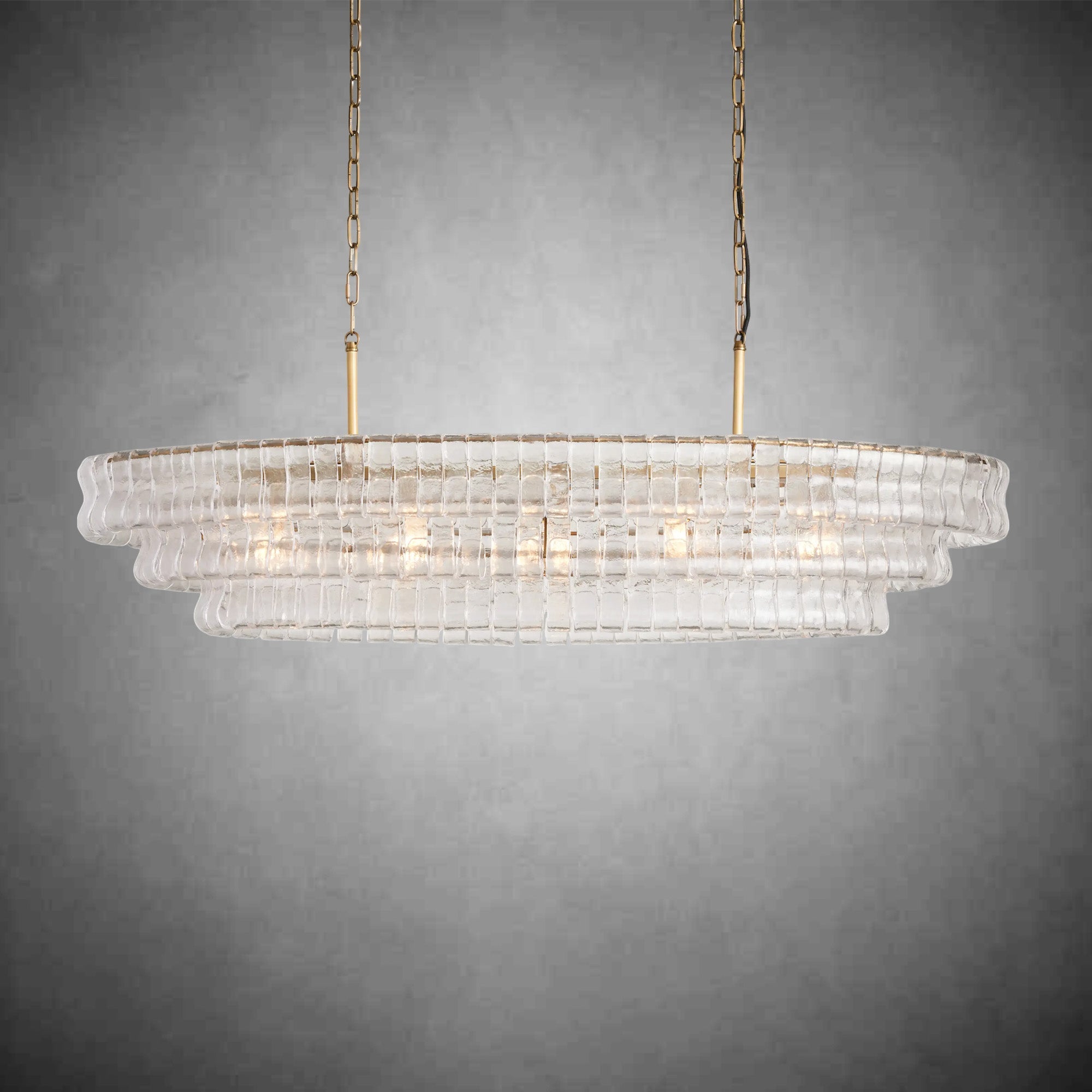 https://cdn.shopify.com/s/files/1/0736/8795/7790/files/ghiaccio-glass-oval-chandelier-5465-merlin-lamps-13.jpg?v=1765380239