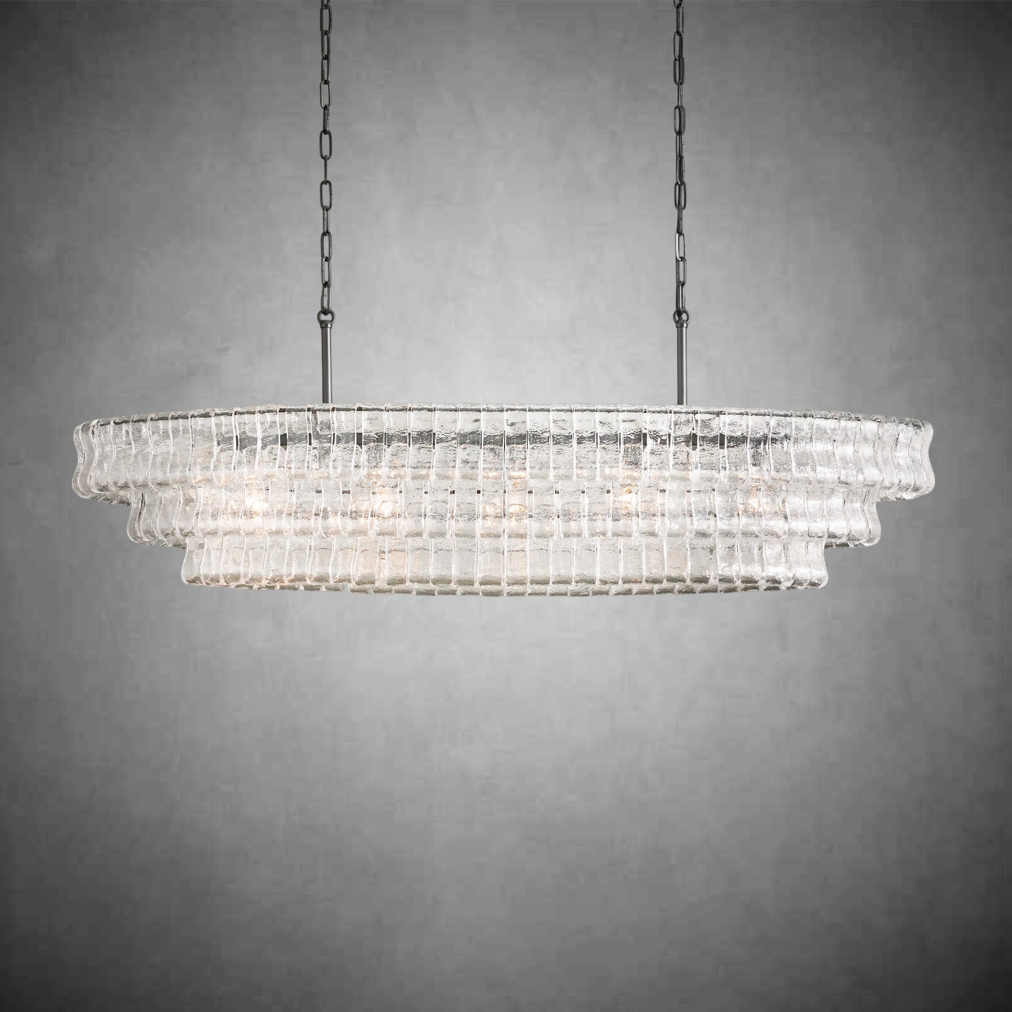 https://cdn.shopify.com/s/files/1/0736/8795/7790/files/ghiaccio-glass-oval-chandelier-5465-merlin-lamps-15.jpg?v=1765380243