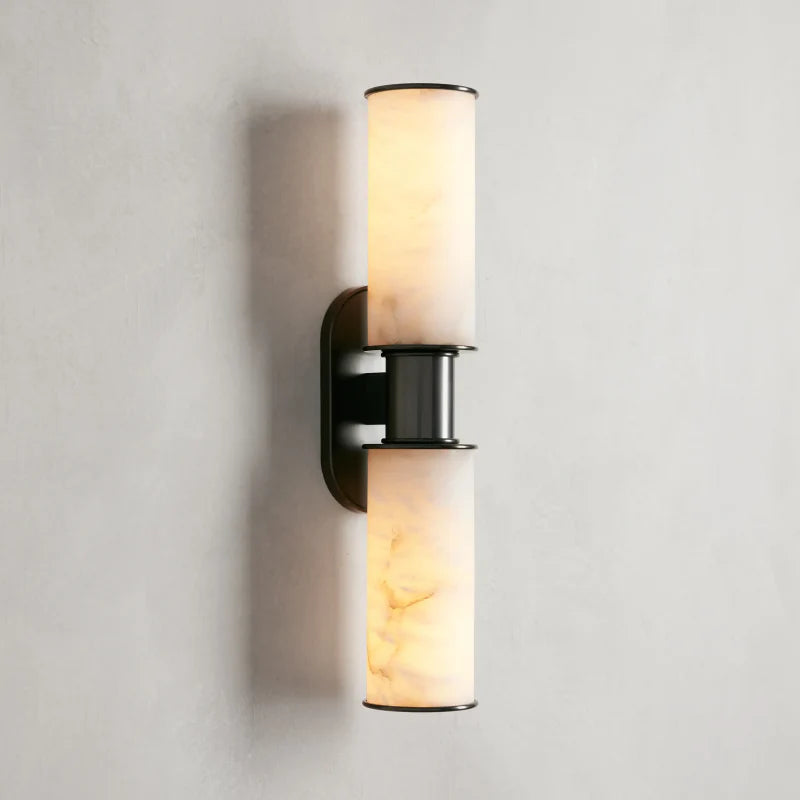 https://cdn.shopify.com/s/files/1/0736/8795/7790/files/harlin-2-light-wall-sconce-in-alabaster-merlin-lamps-10.webp?v=1765382517