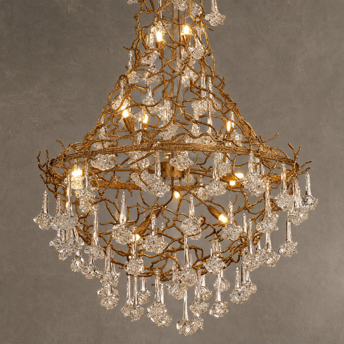 Nature-inspired Brass Tree Chandelier with Glazed Glass Flowers