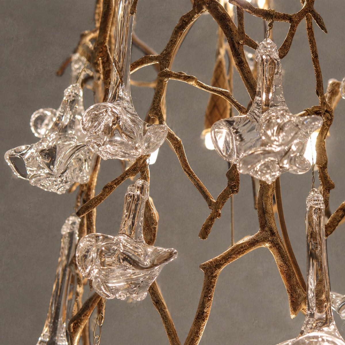 Nature-inspired Brass Tree Chandelier with Glazed Glass Flowers