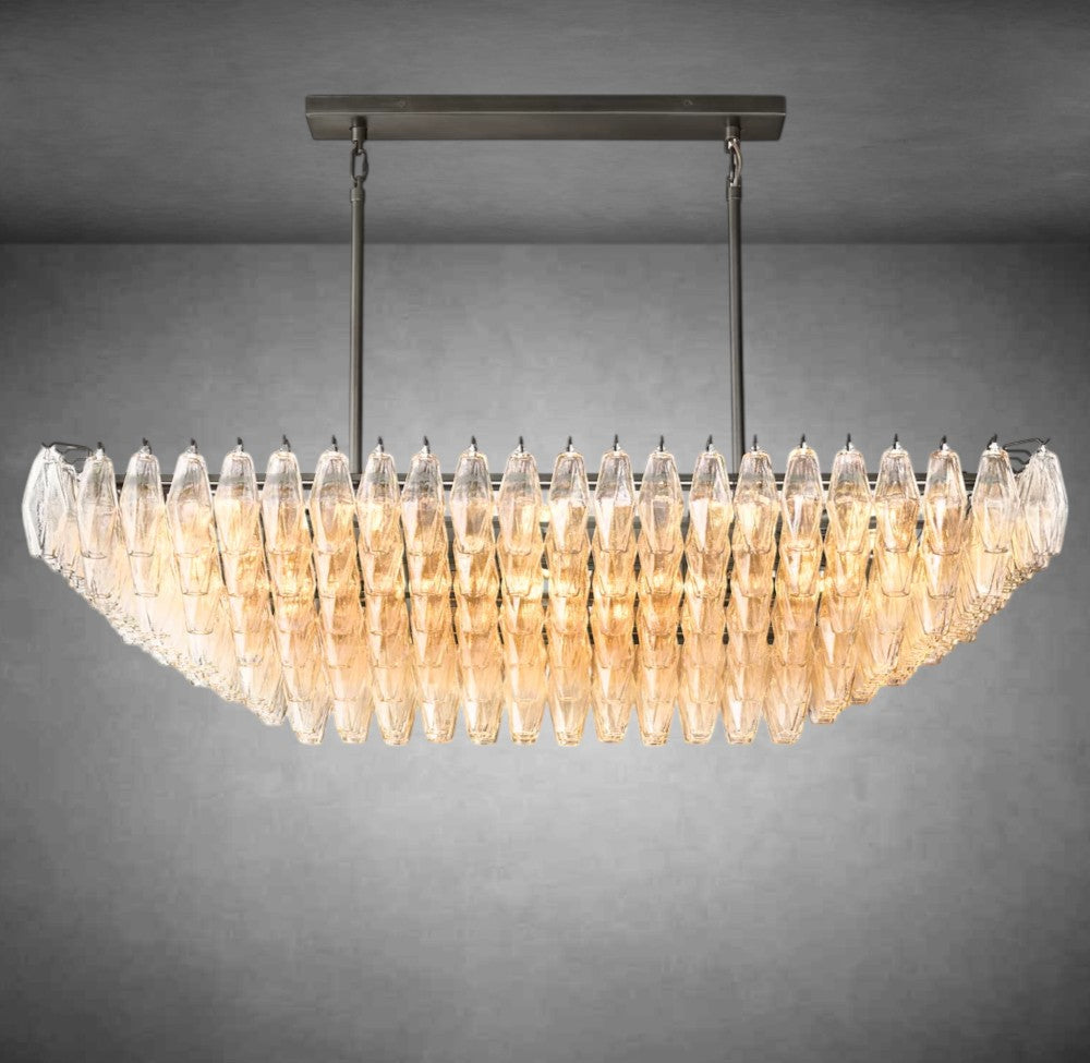 https://cdn.shopify.com/s/files/1/0736/8795/7790/files/renee-clear-glass-tiered-rectangular-chandelier-54-74-merlin-lamps-3.jpg?v=1765395139