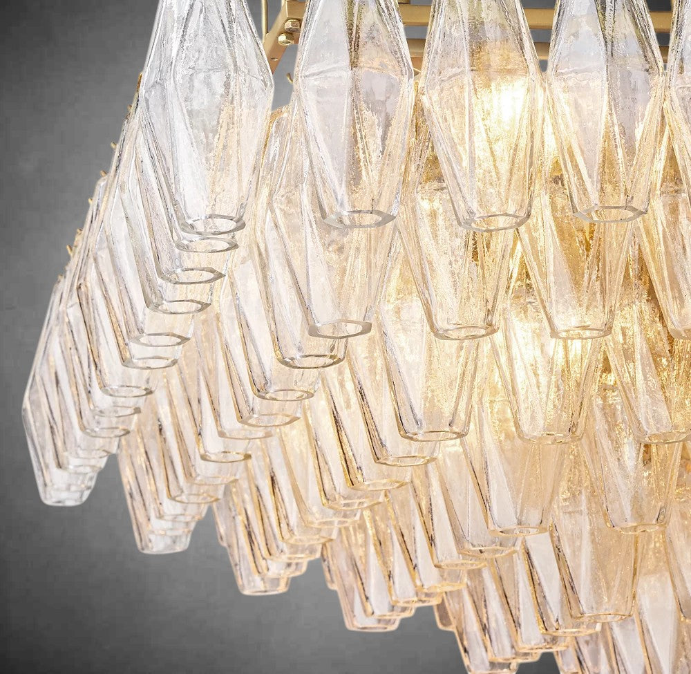 https://cdn.shopify.com/s/files/1/0736/8795/7790/files/renee-clear-glass-tiered-rectangular-chandelier-54-74-merlin-lamps-5.jpg?v=1765395143