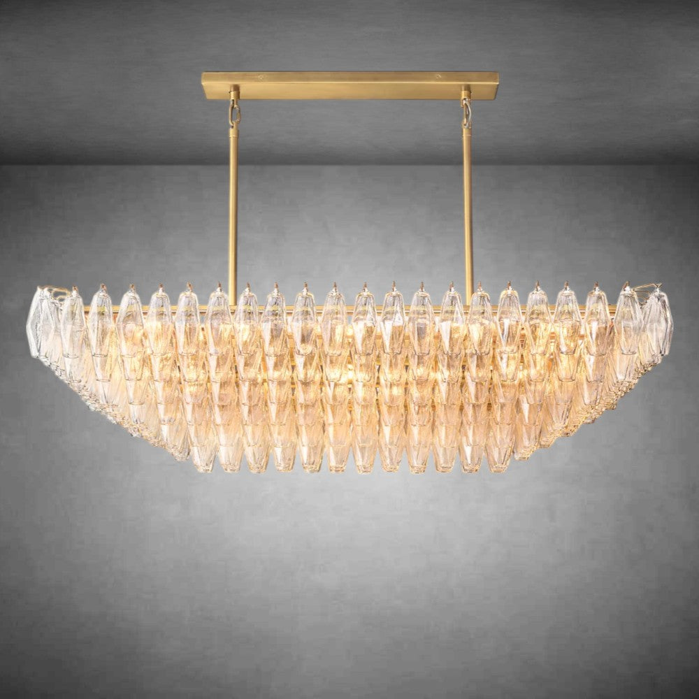 https://cdn.shopify.com/s/files/1/0736/8795/7790/files/renee-clear-glass-tiered-rectangular-chandelier-54-74-merlin-lamps.jpg?v=1765395136