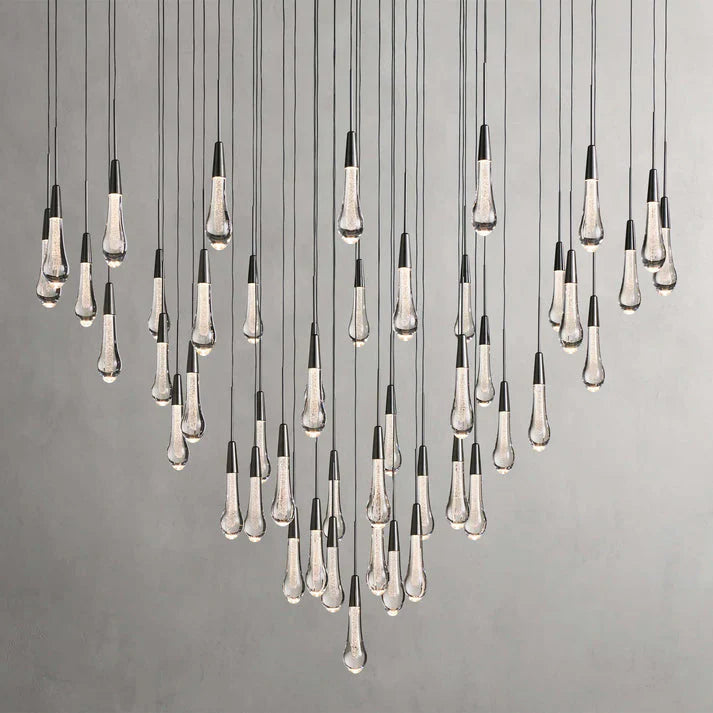https://cdn.shopify.com/s/files/1/0736/8795/7790/files/solitaire-modern-17-24-36-58-round-chandelier-lighting-merlin-lamps-12.webp?v=1765374448