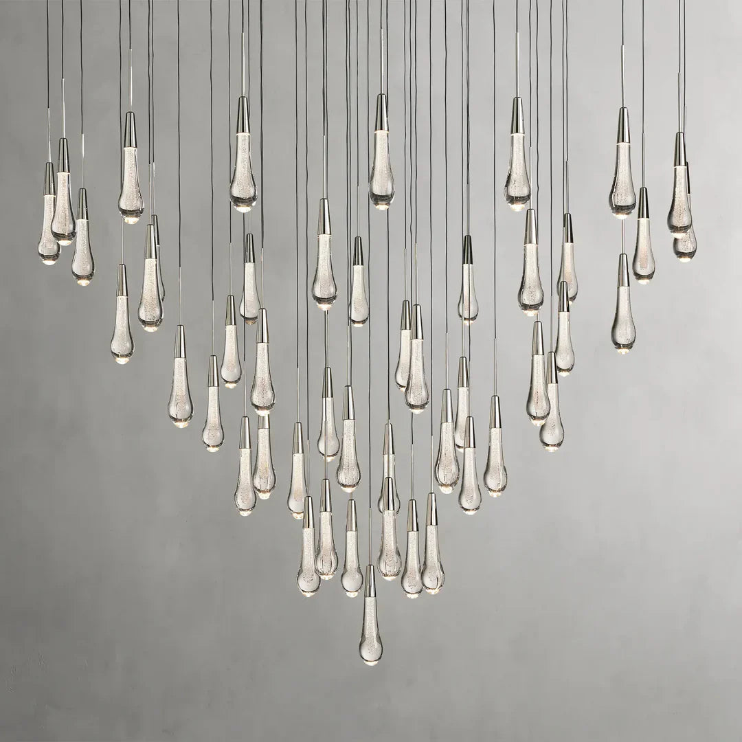 https://cdn.shopify.com/s/files/1/0736/8795/7790/files/solitaire-modern-17-24-36-58-round-chandelier-lighting-merlin-lamps-13.webp?v=1765374449
