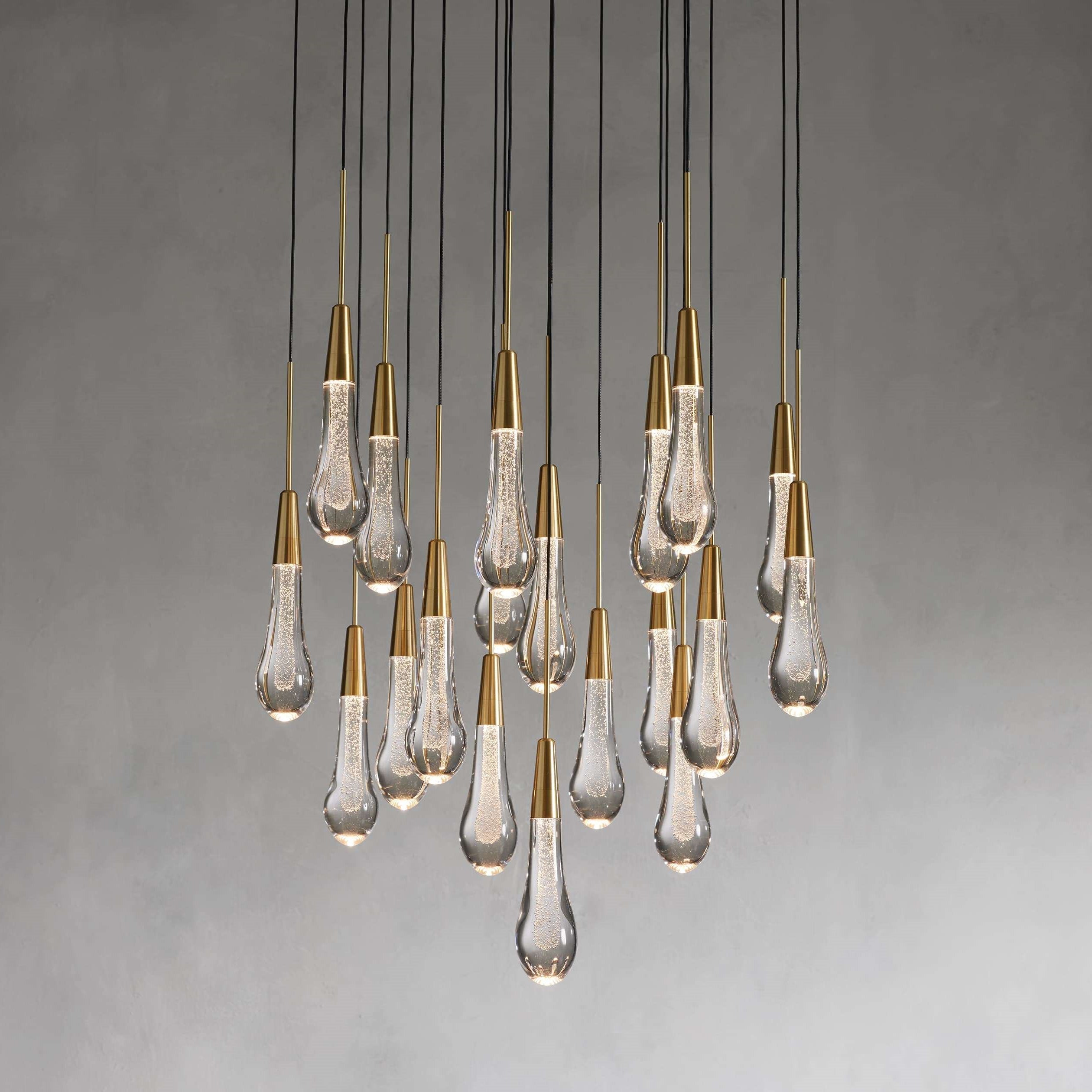 https://cdn.shopify.com/s/files/1/0736/8795/7790/files/solitaire-modern-17-24-36-58-round-chandelier-lighting-merlin-lamps-7.jpg?v=1765374438