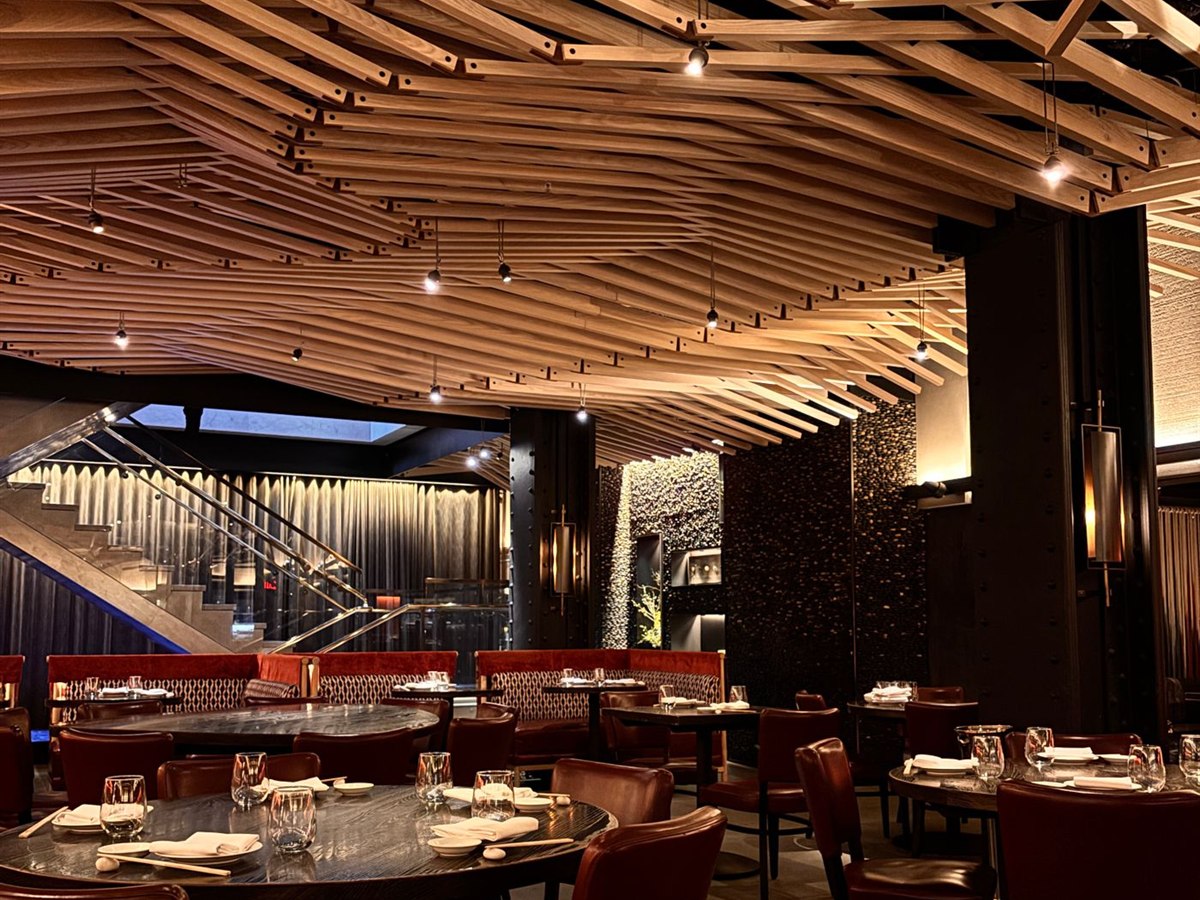Restaurant dining room with pendant and track lighting